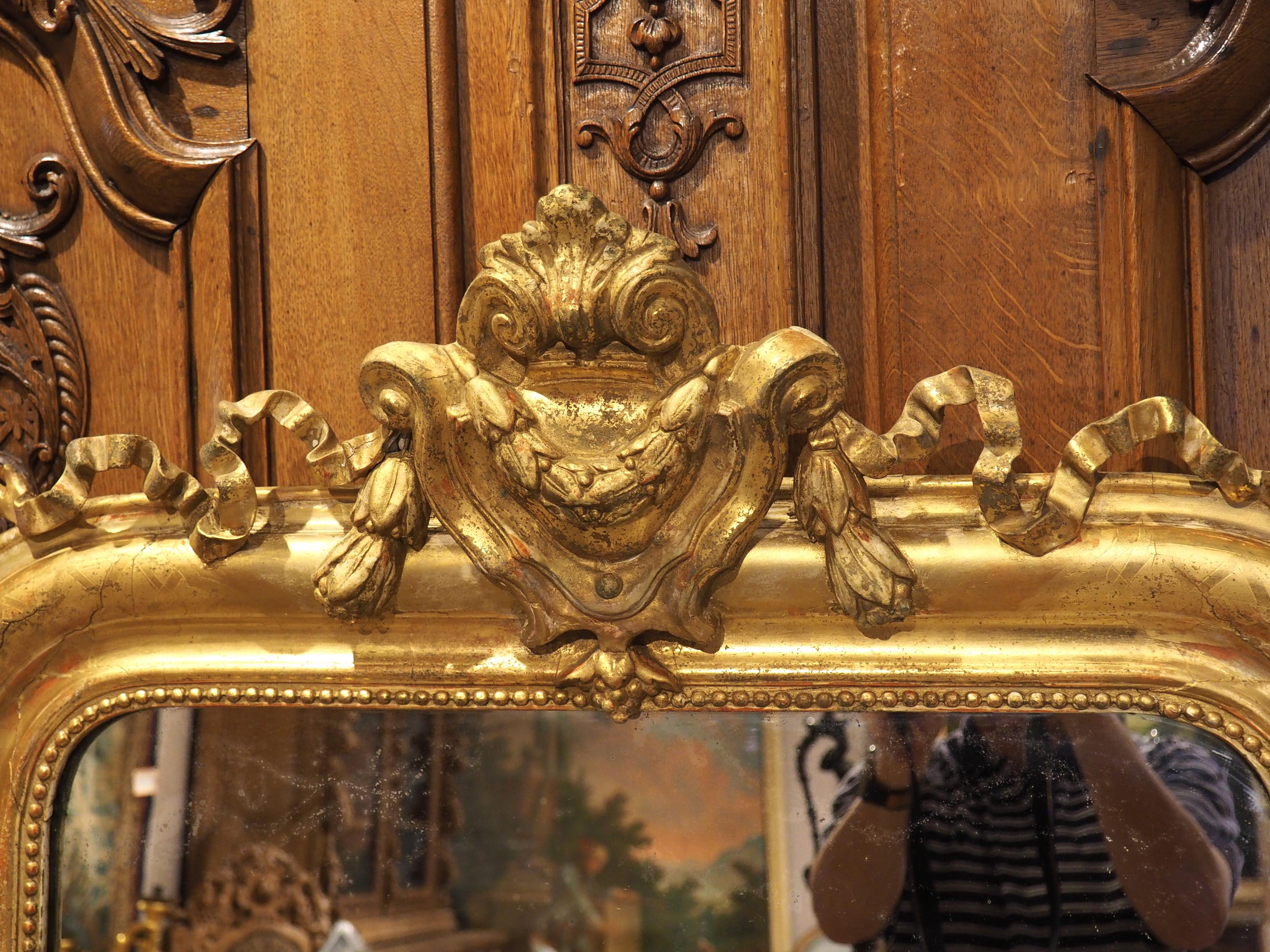 Hand-Carved 19th Century Gold Louis Philippe Mirror with Beading and Ribboned Cartouche