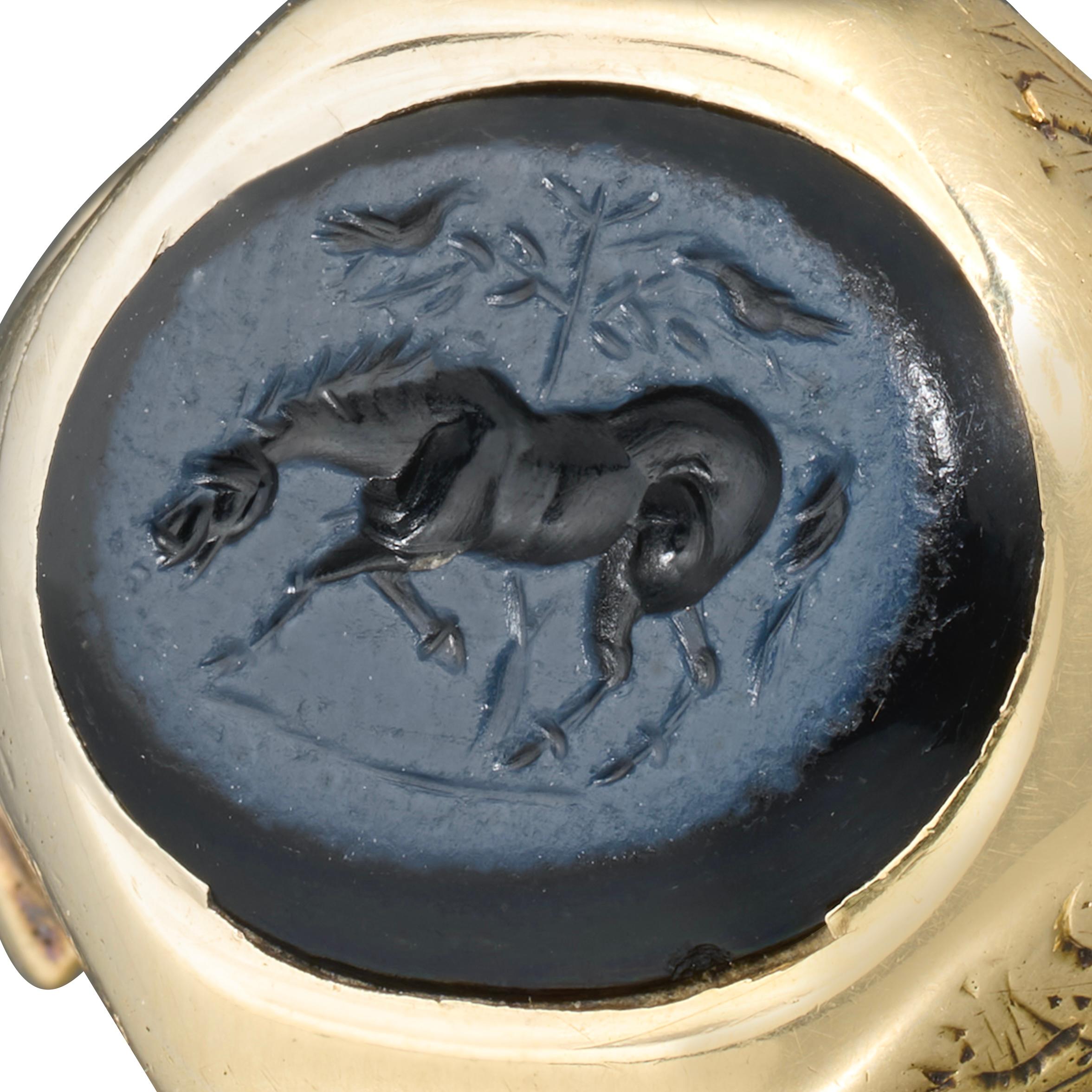 Anillo de oro del siglo XIX con una antigua calcografía romana Nicolo de un caballo. en venta 11