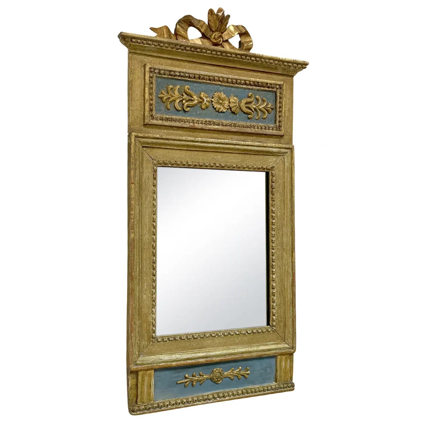 A gold, antique Swedish Gustavian wall mirror made of hand carved gilded Pinewood with its original mirrored glass, in good condition. This dedicated piece was designed, produced by an unknown artist from Stockholm and it was later restored and sold