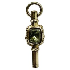 Antique 19th century gold Watch-Key with each side a different stone