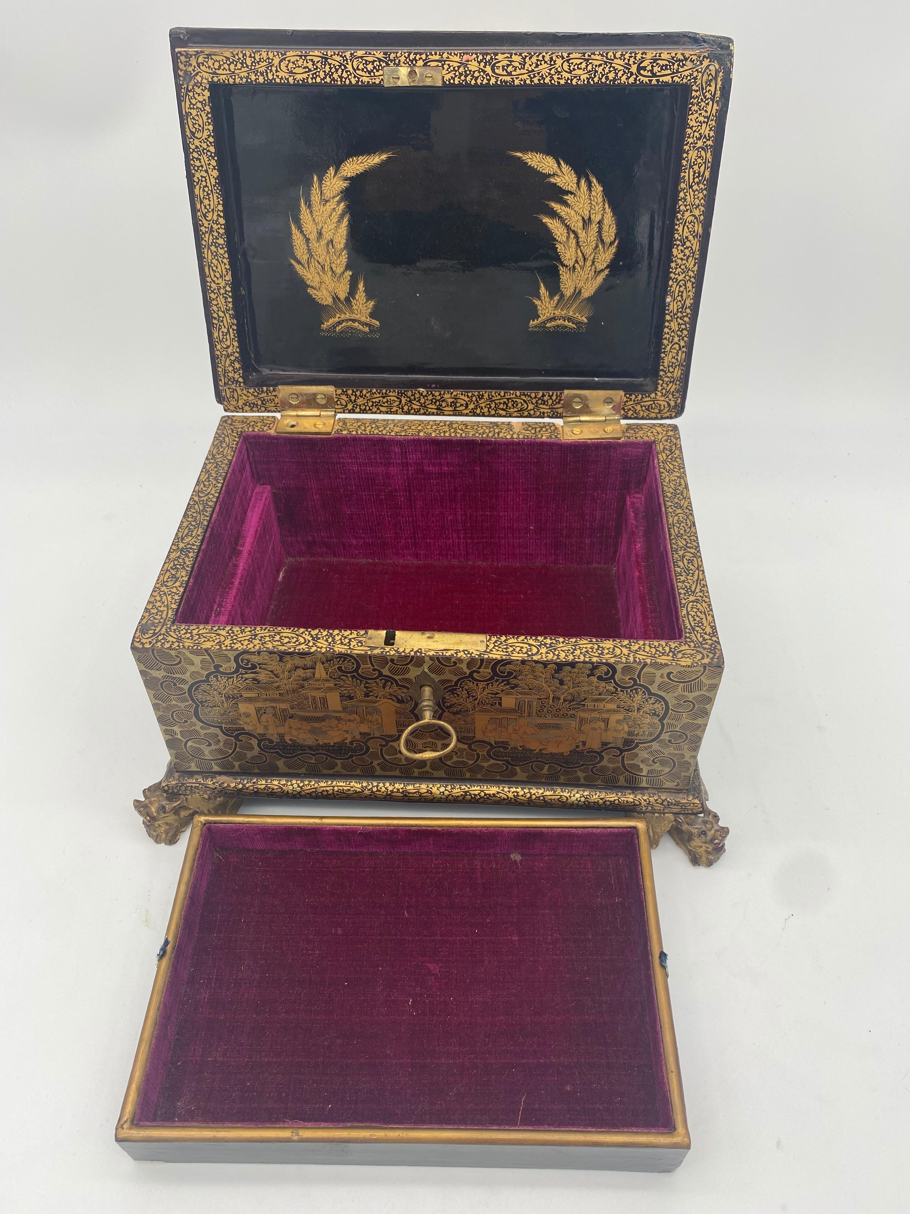 Qing 19th Century Golden Black Lacquer Chinese Jewelry Box with Dragon Feet For Sale
