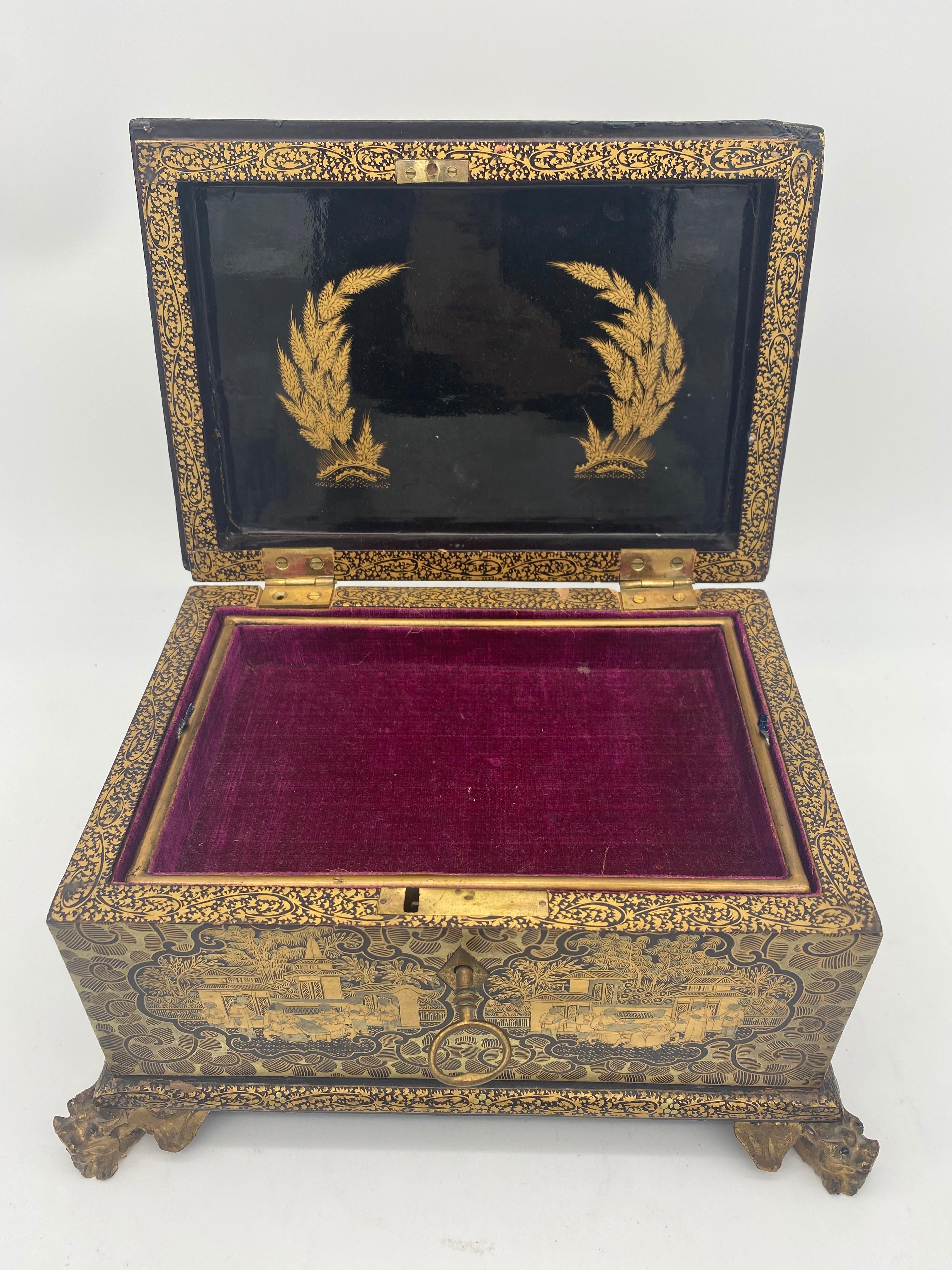 Hand-Carved 19th Century Golden Black Lacquer Chinese Jewelry Box with Dragon Feet For Sale