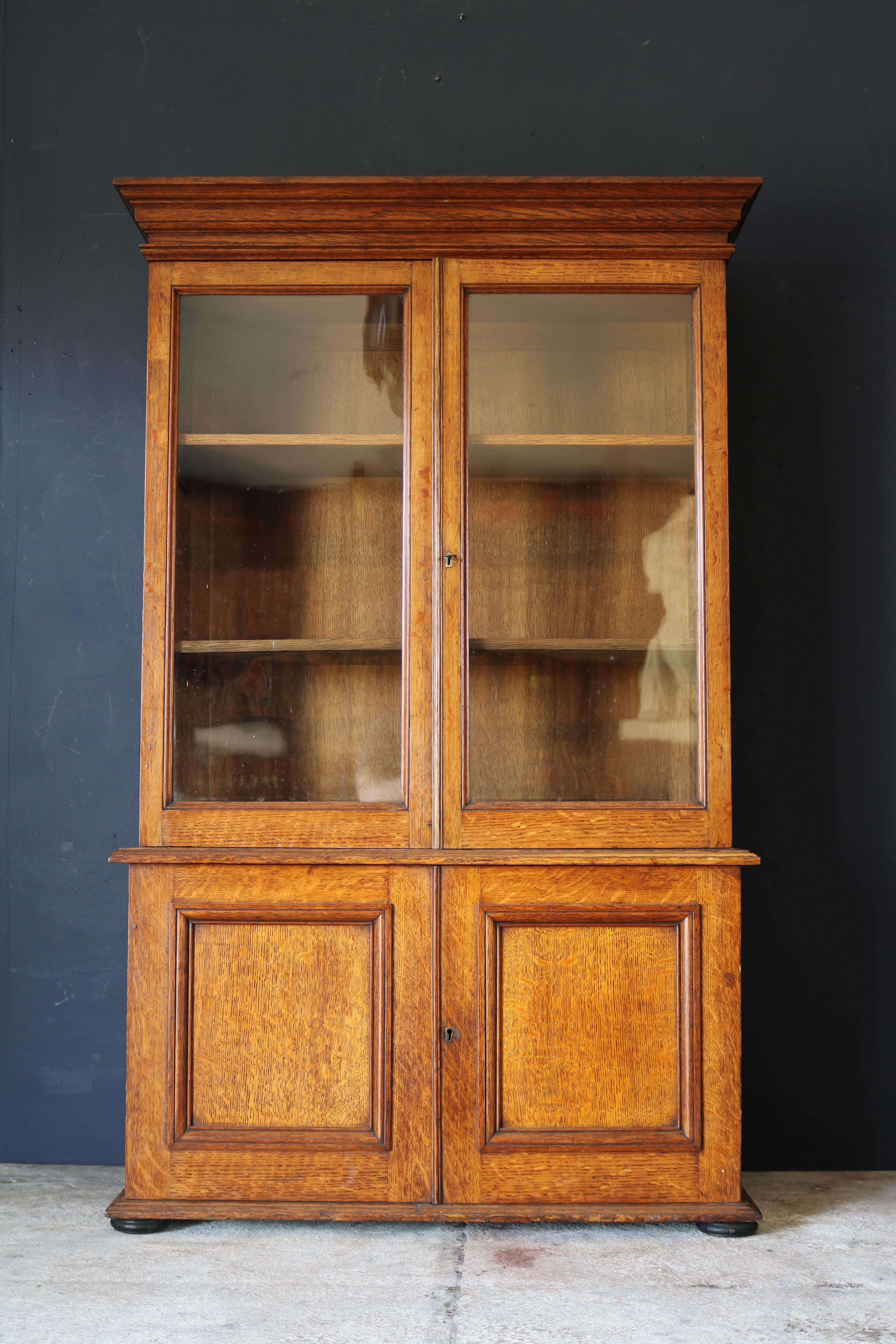 A rare 19th century English dwarf bookcase made from best quality golden oak, the proportions and scale of the bookcase are fantastic and most would be forgiven for thinking it’s a normal sized bookcase, circa 1880, with adjustable book shelves and