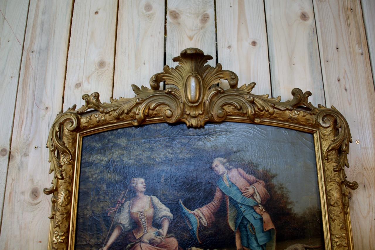 trumeau du 19ème siècle en bois doré, avec glace d'origine et une huile sur toile dans sa partie supérieure en très bon état.