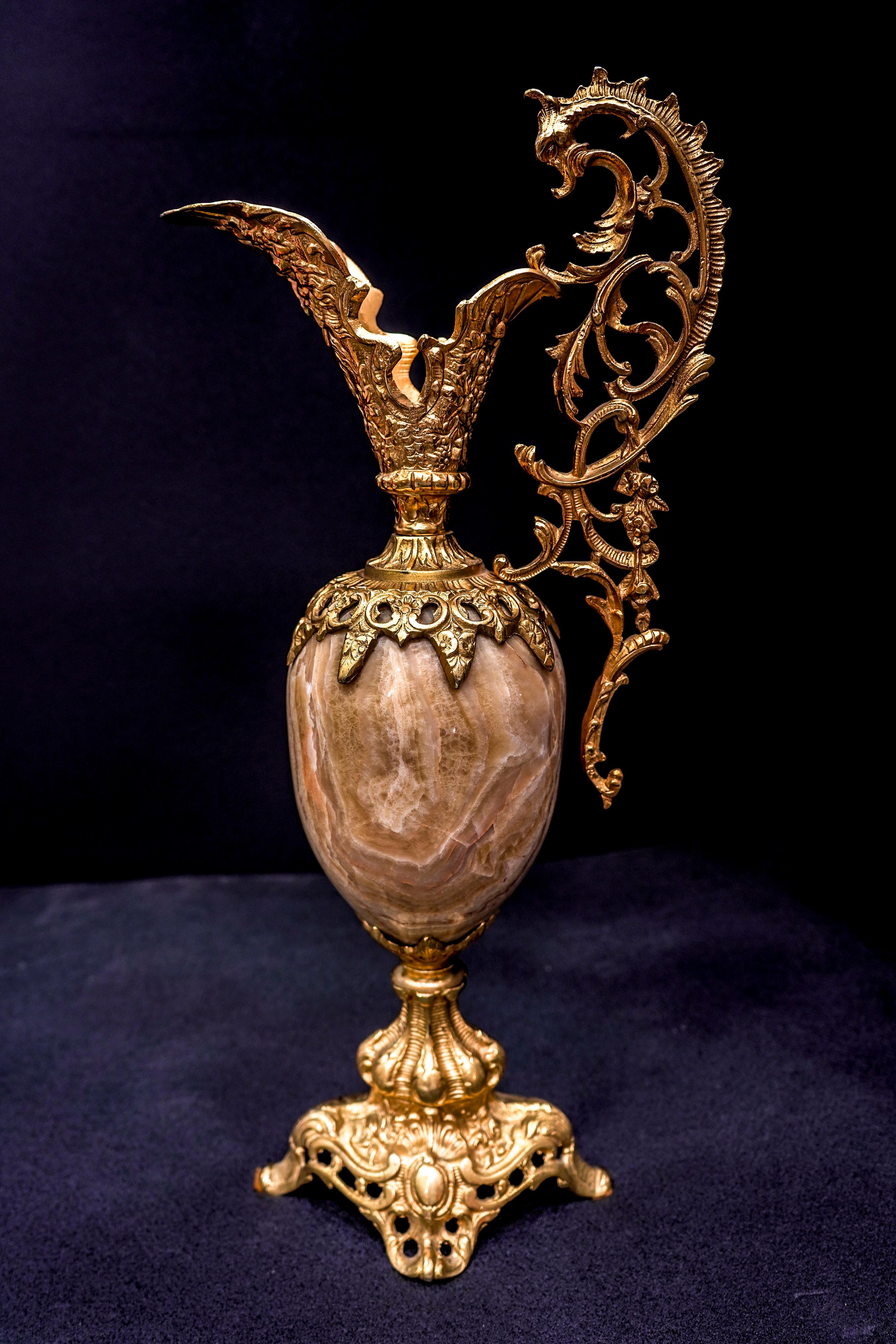 Amazing 19th century golden bronze ( ormolu) and agate stone Spanish Baroque style Amphore. The golden bronze has rockeries, scrolls and a medallion of the god Bacchus on the back of the mouth.
Beautiful and stunning piece of collection, very