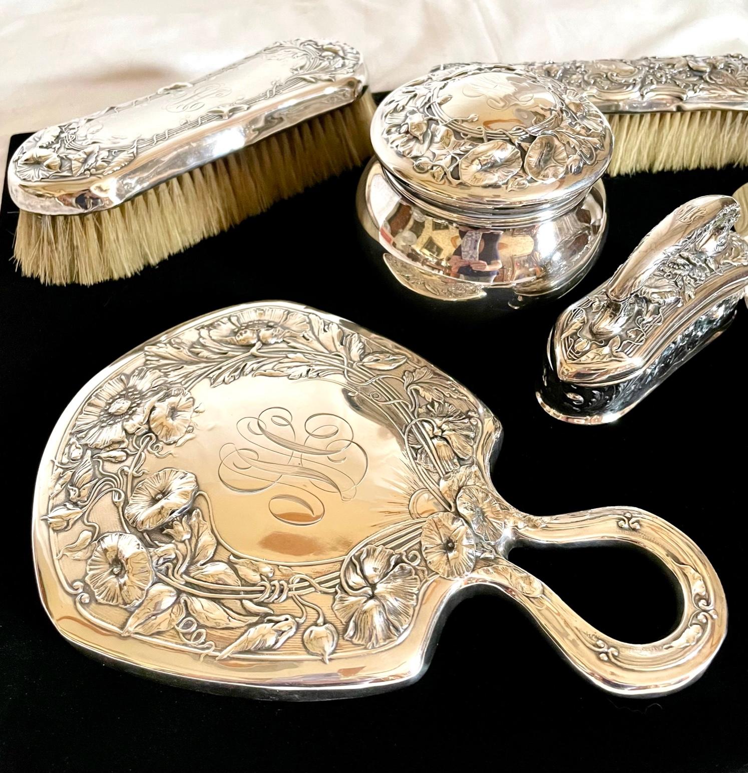 19th century Gorham Art Nouveau sterling silver Vanity set, 7 pieces.

This stunning Art Nouveau sterling silver set is imaginatively created by Gorham. Each piece, as part of the matching set, abounds in glorious Art Nouveau embossed features