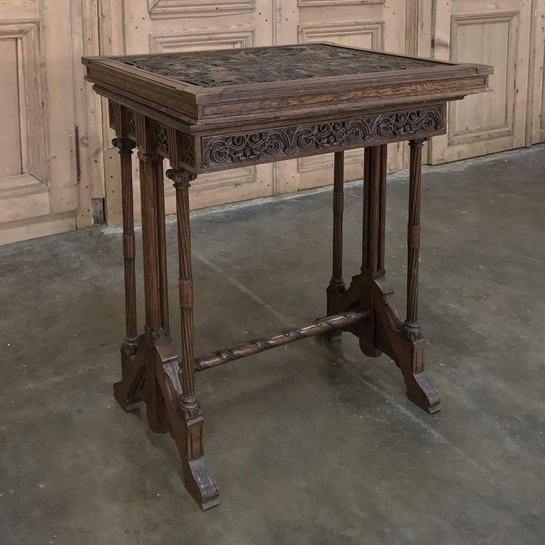 19th century Gothic oak collector's table is an unusual piece obviously created for a specific request. Ideal for the collector, it features an incredibly carved removable top case, and a Gothic-inspired table below that functions as a normal end