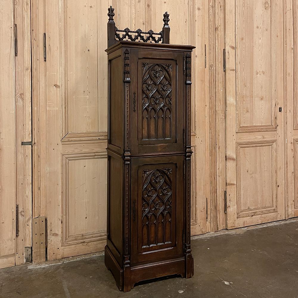 19th century Gothic Revival Homme Debout ~ Cabinet is the masculine answer to the feminine bonnetiere, and was designed to stand sentry just inside the door most used by the master of the house so that he would have a repository for hat, boots,