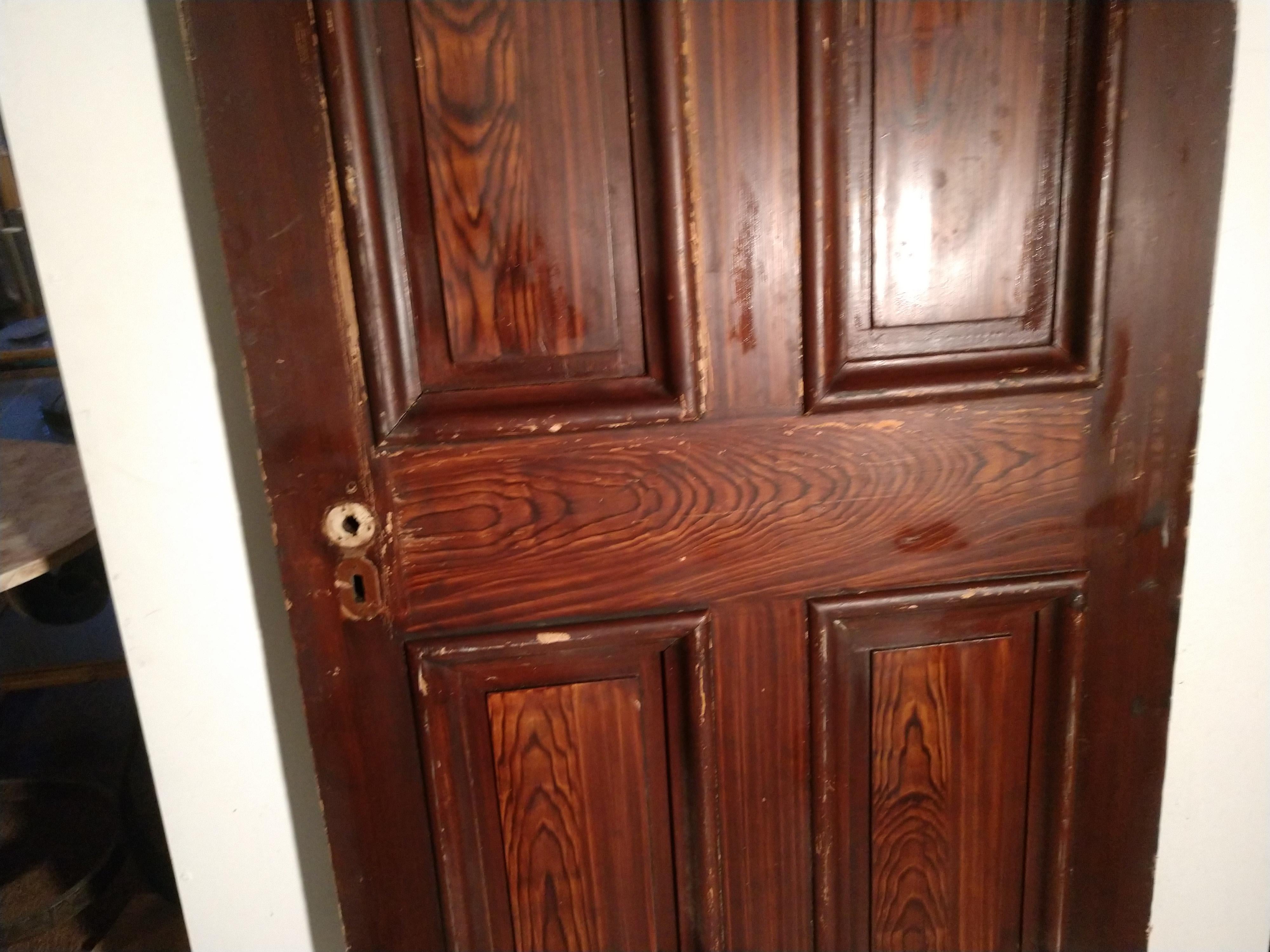 Hardwood 19th Century Grain Painted Paneled Wood Door For Sale