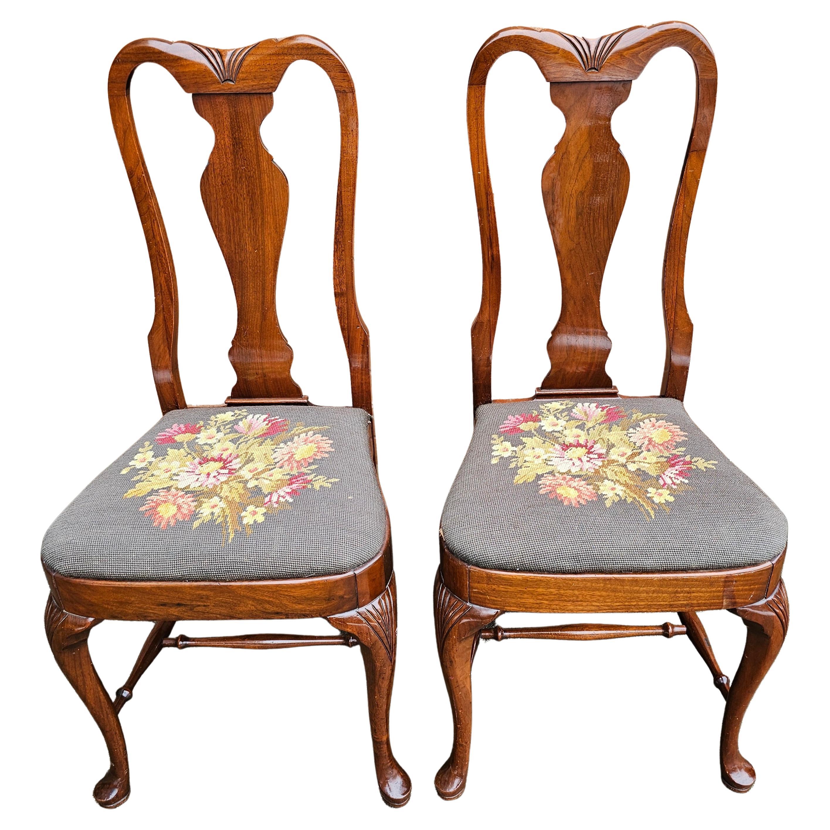A rare pair of 19th Century Grand  Ledge Chair Company Mahogany and Needlepoint upholstered seat Dining Chairs in the Queen Anne style. Clean antique condition