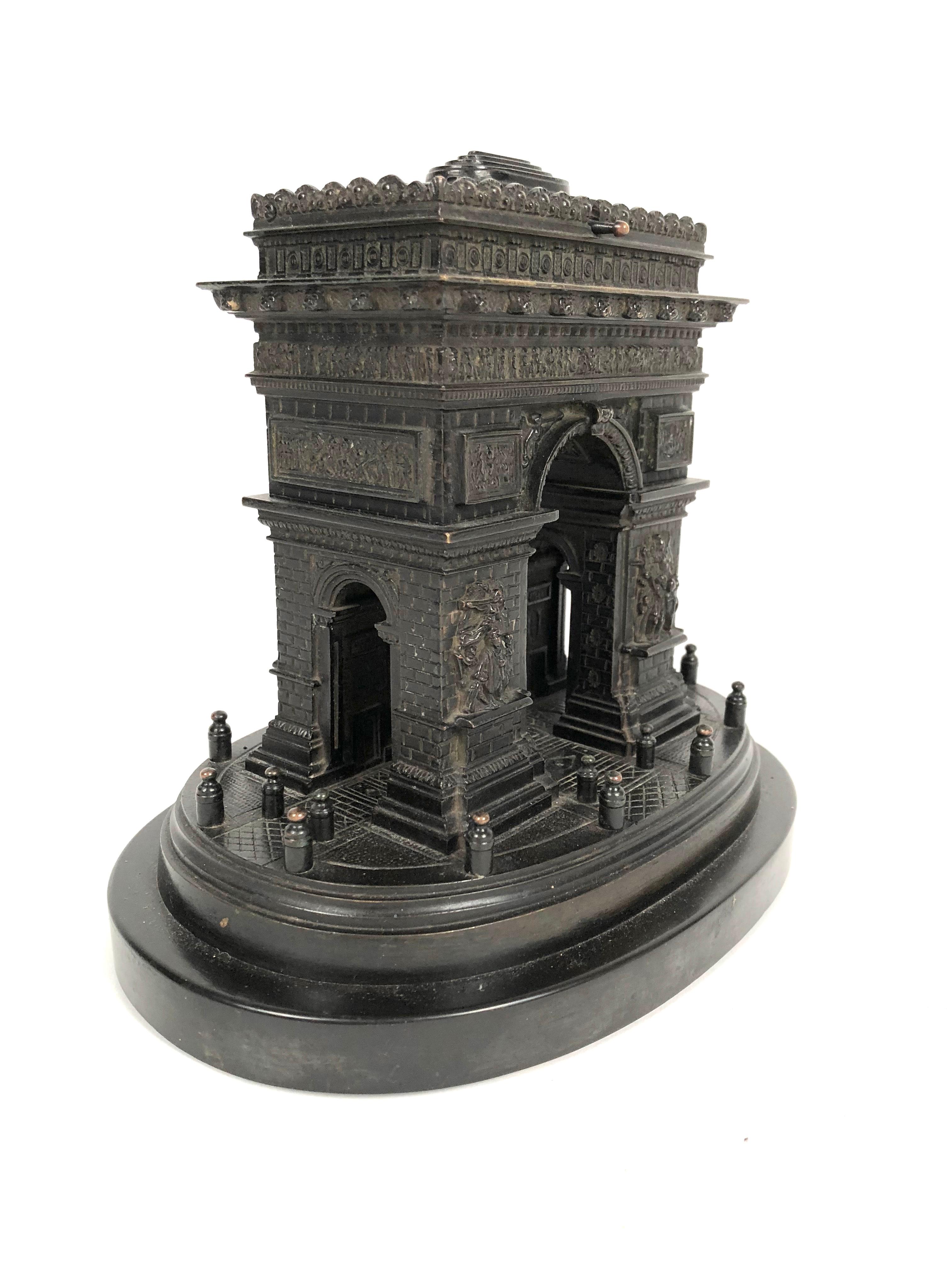 A generously sized and well detailed Grand Tour bronze architectural model of the Arc de Triomphe in Paris, mounted on a black marble base. Created as a high end souvenir in the late 19th century for travelers to Paris, this model is very well