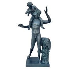 Escultura de bronce Gran Tour del siglo XIX de un sátiro con el niño Dionisio