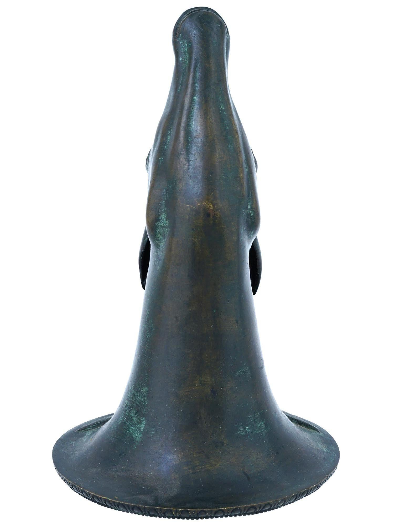 Our antique Grand Tour period rhyton cup in the form of a deer head has a fine verdigris patina and stands 10 inches tall.  Apparently unsigned.