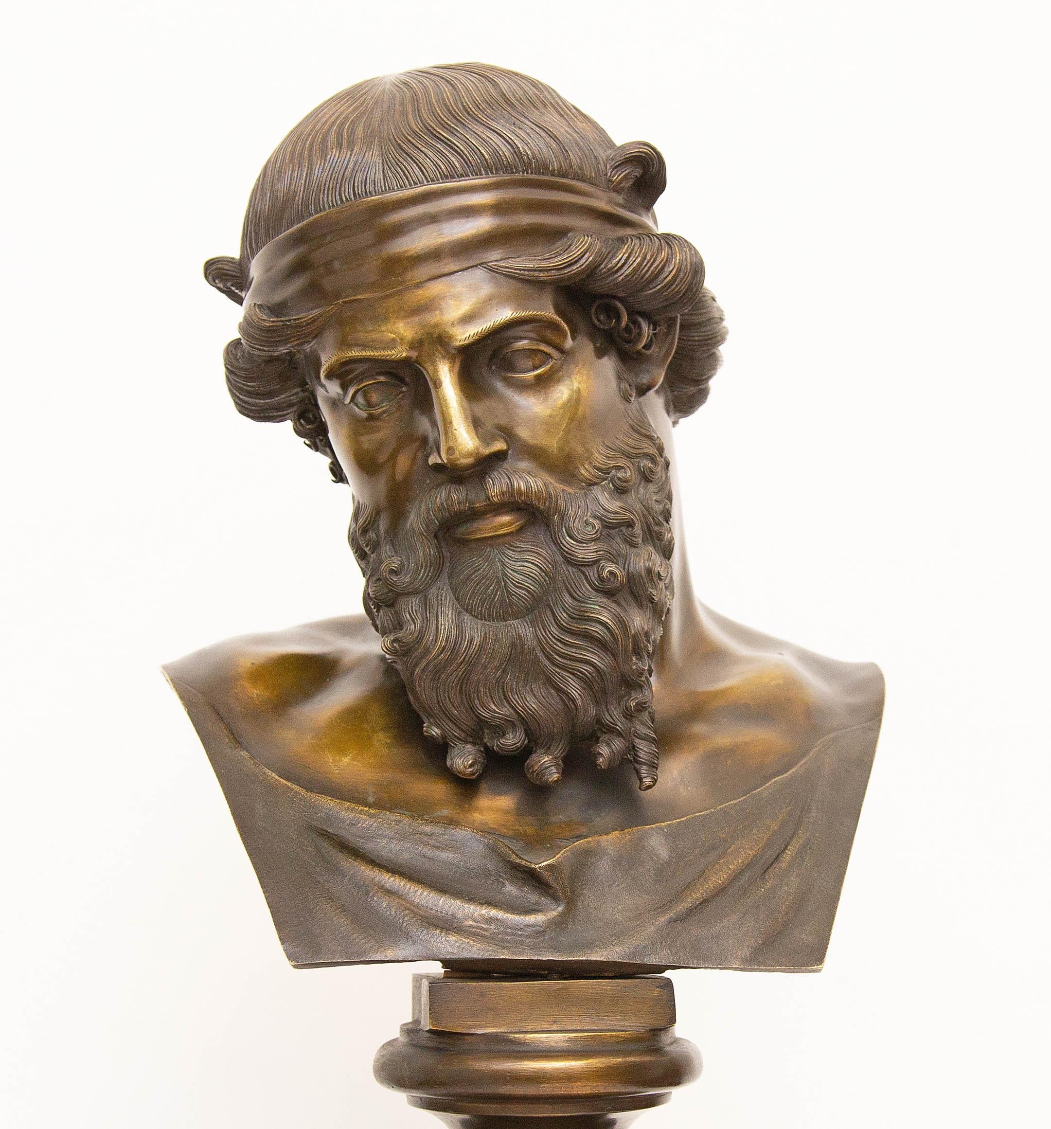 19th century patinated bronze bust of Plato. Mounted on later wood base. After the original found at Herculaneum, Villa of the Papyri, in 1759. The sculpture at times has also been identified as Dionysos and Priapus.