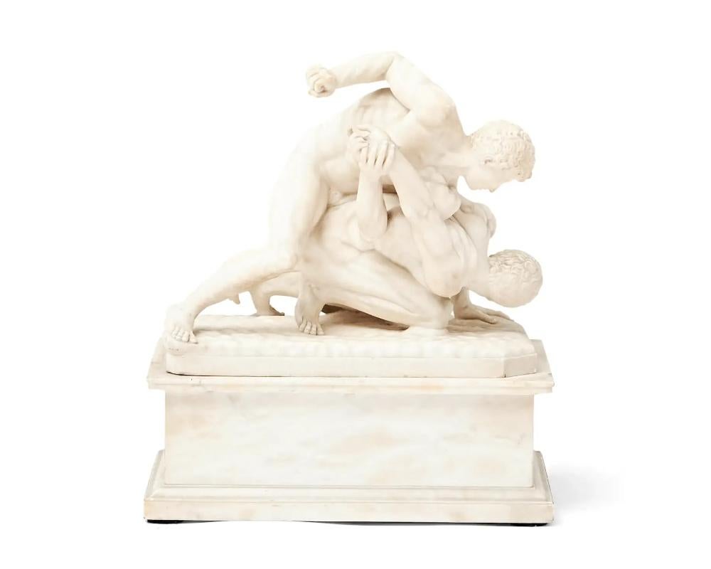 19th century grand tour carved alabaster model of the wrestlers ,circa 1895

modeled after the Roman statue of the same name, currently located in the Uffizi Gallery, 
on a rectangular alabaster base, statue and base together

measures:  HT. 19