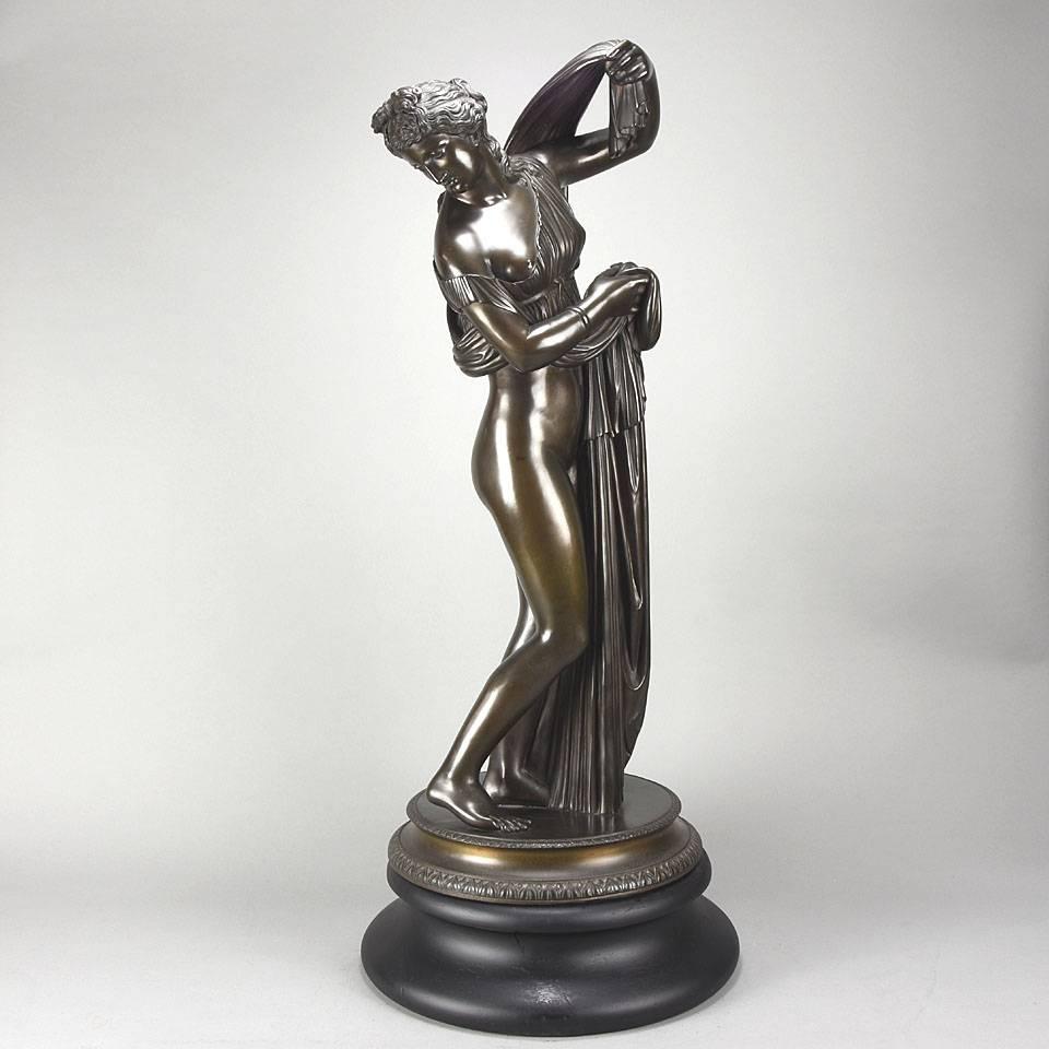 As part of the important bronze sculpture collection we are delighted to offer this impressive late 19th Century Art Nouveau period classical bronze study of a partially draped goddess, raising her light peplos (draped clothing) to uncover her hips