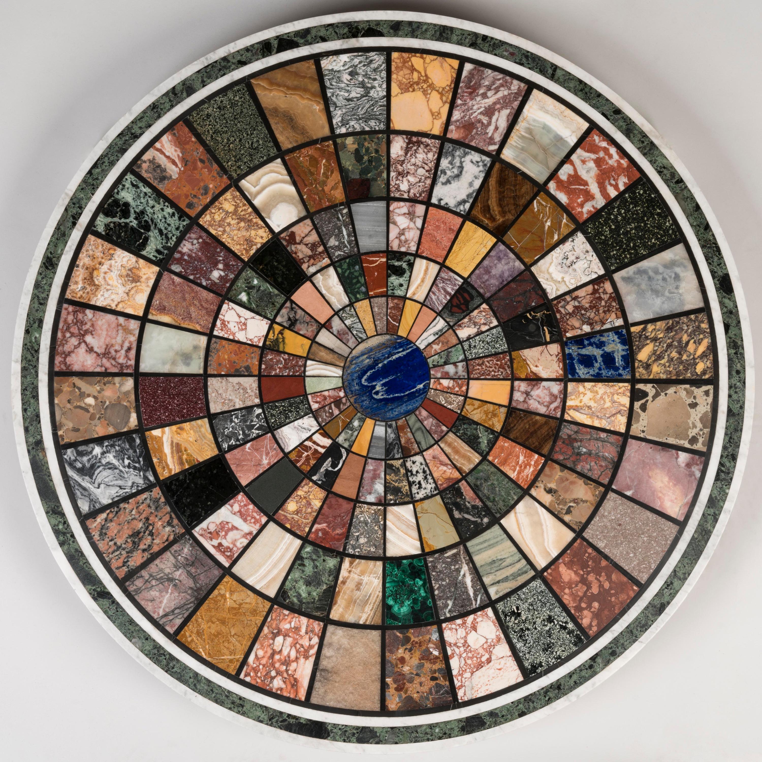 An Impressive 'Grand Tour' Specimen Marble Top Centre Table
The base attributed to William Trotter of Edinburgh

Constructed in a finely patinated mahogany, with a Florentine Pietra Dura radially inlaid platform. Rising from an incurved tripartite