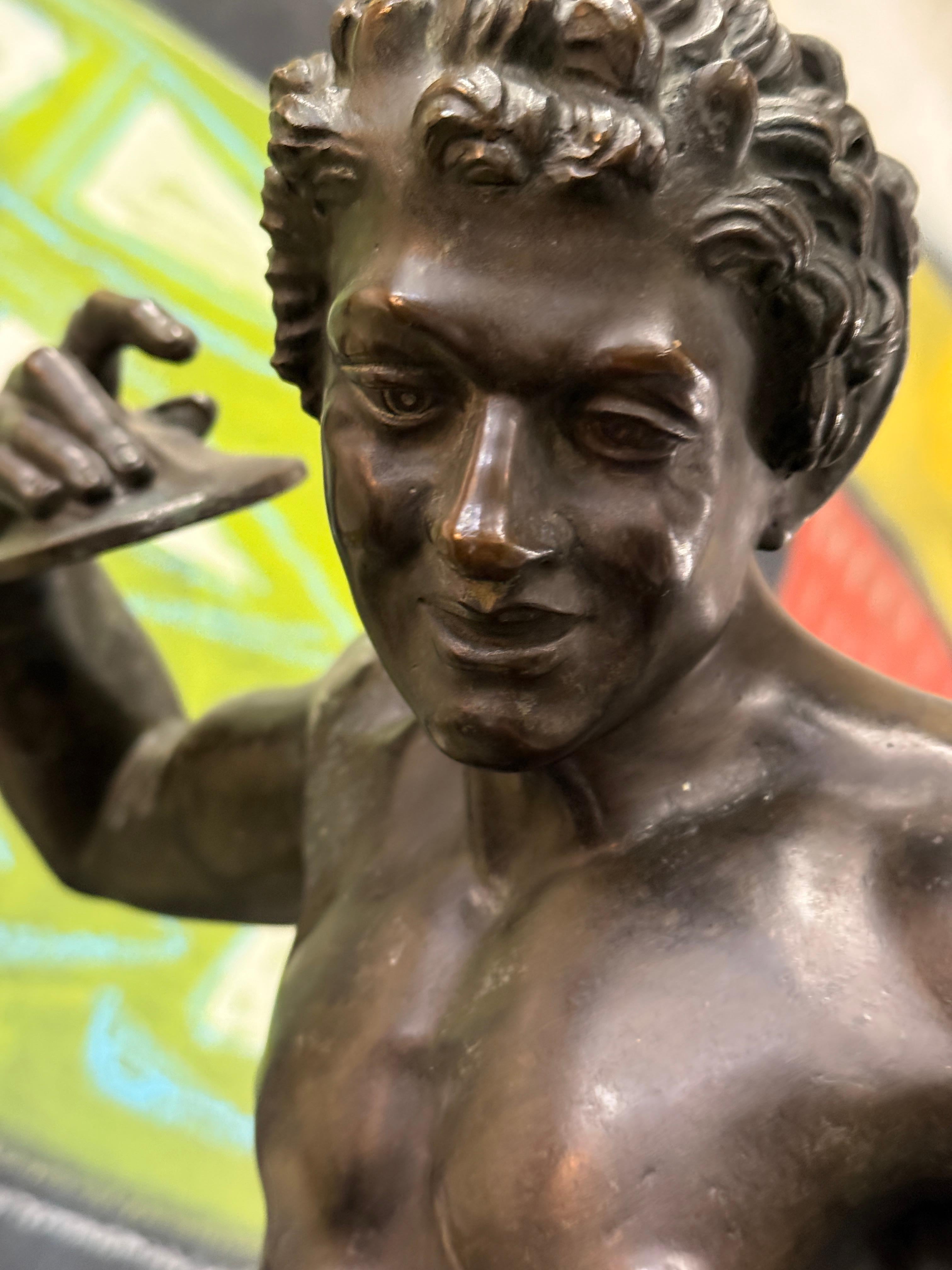 A beautifully cast Grand Tour Neo Classical Bronze of a Dancing Faun or Satyr holding cymbals. The sculpture has wonderful detail and the hands and feet are beautifully cast and finished. The sculpture has an old repair to a split along one leg,