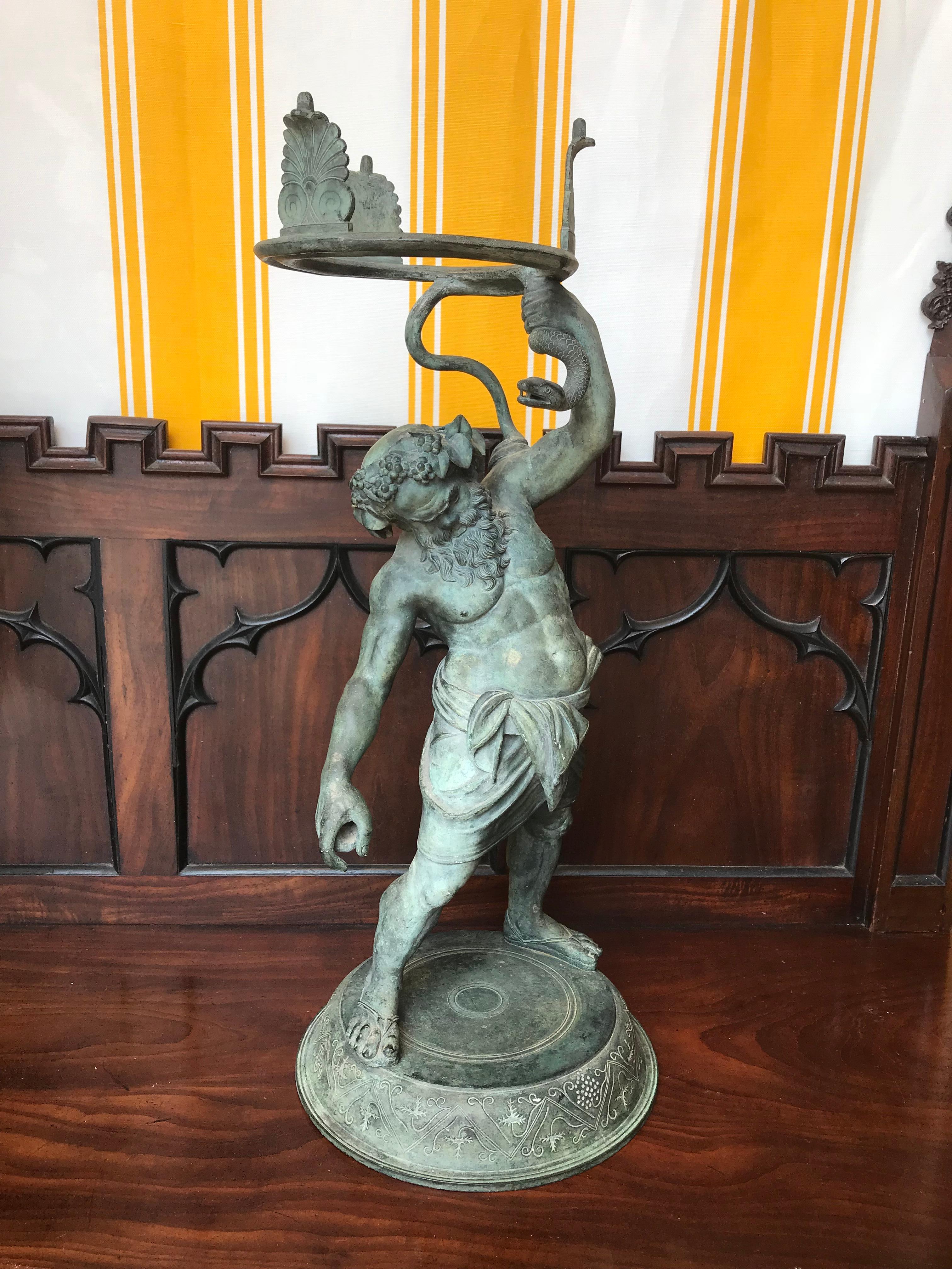 19th century Grand Tour patinated bronze figure statue of Silenus, The God of Wine.

- Identical to that found in Herculaneum.

An Greek mythology, Silenus was the tutor of the god Dionysus. His features are similar to those of a satyr, but he