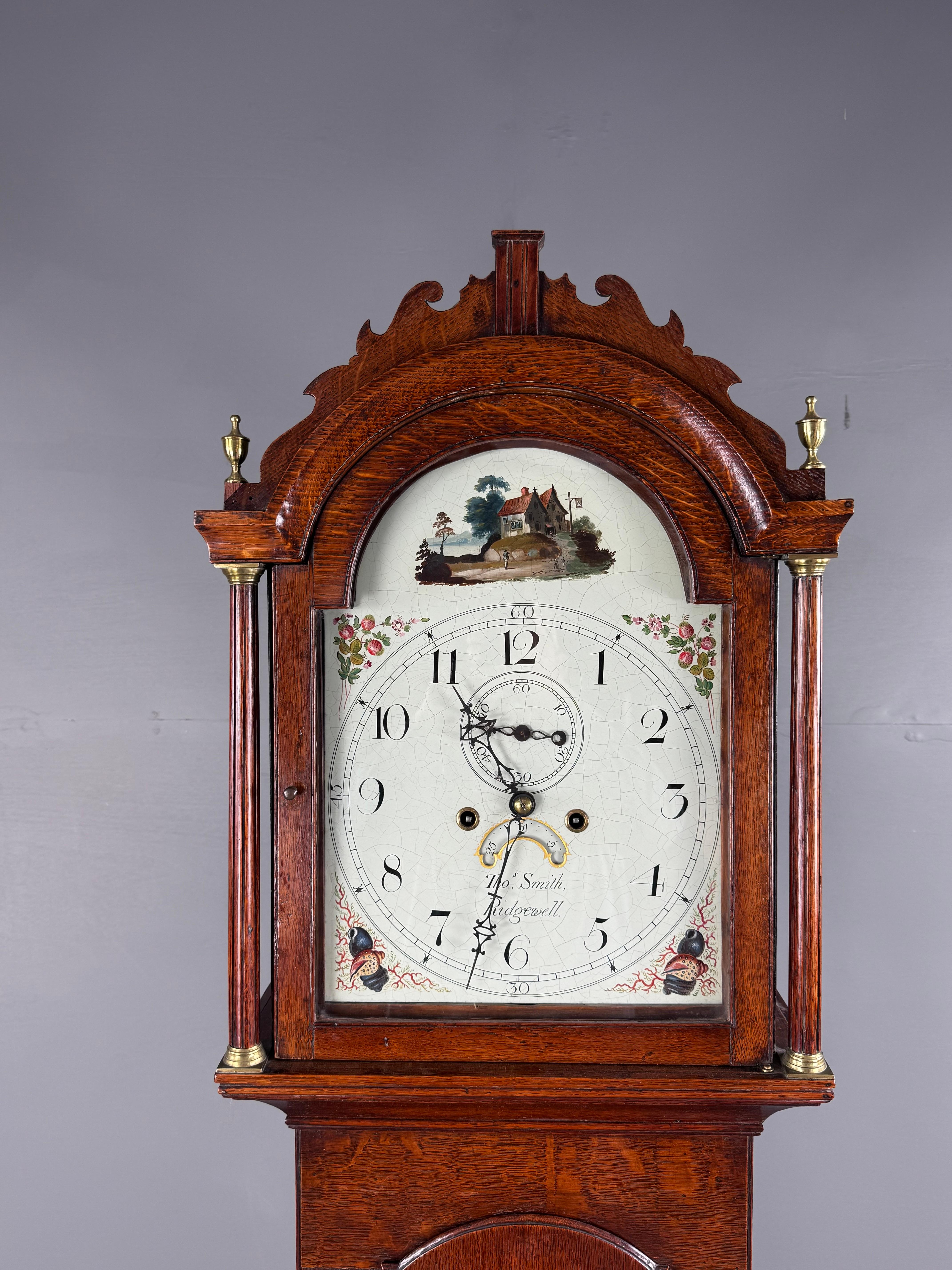 Good Quality mid 19th century oak Grandfather clock by Thomas Smith of Ridgewell 
.Ridgewell is a small village in Suffolk England where the clock maker had his workshop .
The clock is in very good condition ,in full working order keeping good time 