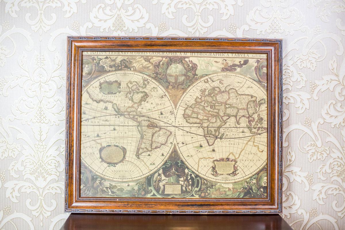 We present you a colorful antique graphic from the 19th century depicting a hydrographic world map and an allegory of fire, air, water, and earth.
This graphic is closed in an oak frame with glass.

The item is in very good condition.