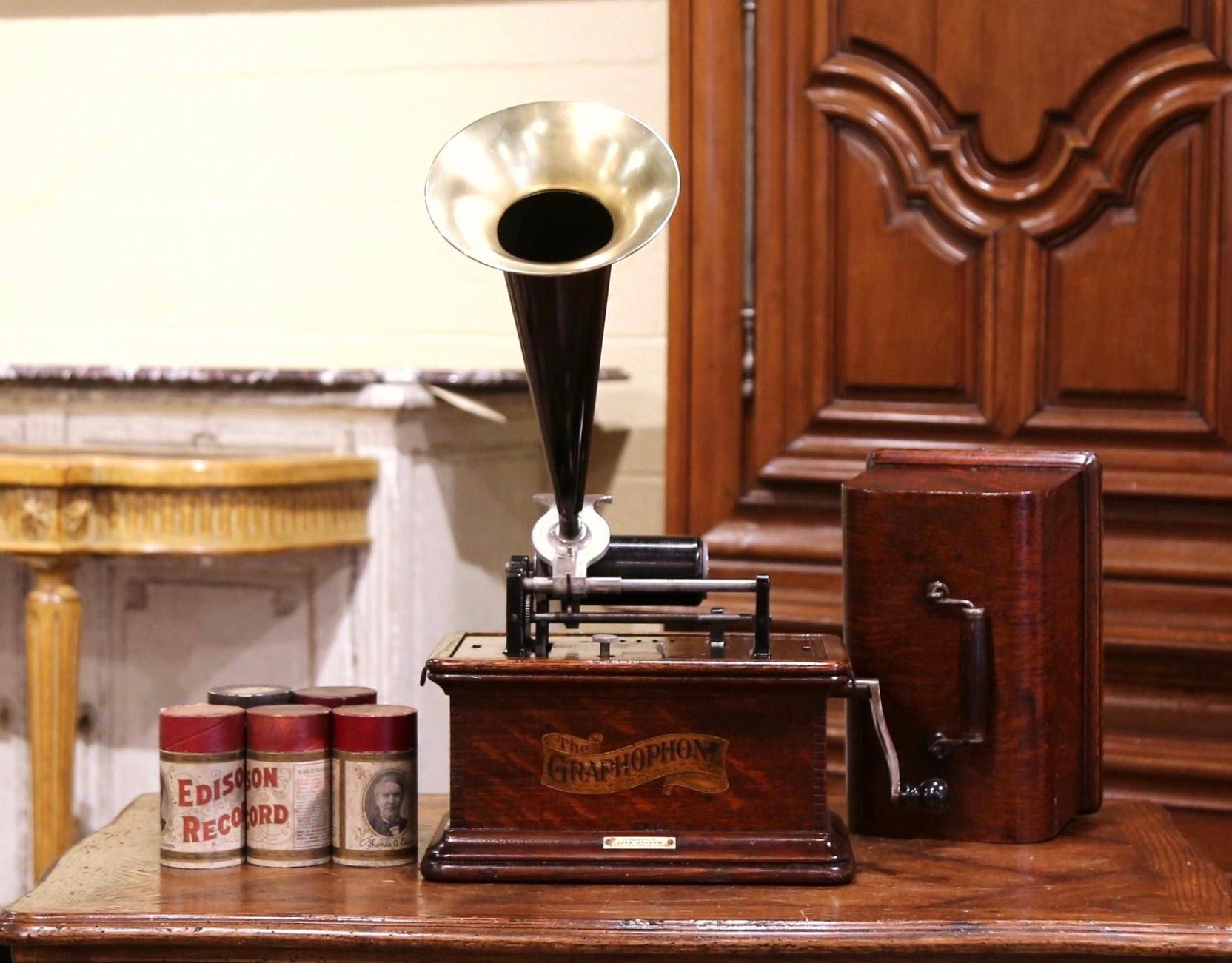 The first American cylinder talking machine! Crafted in New York circa 1890, this graphophone features the original oak casing, and five rolls of music. It is very good working order (check our attached video)
Originally know as the phonograph, the