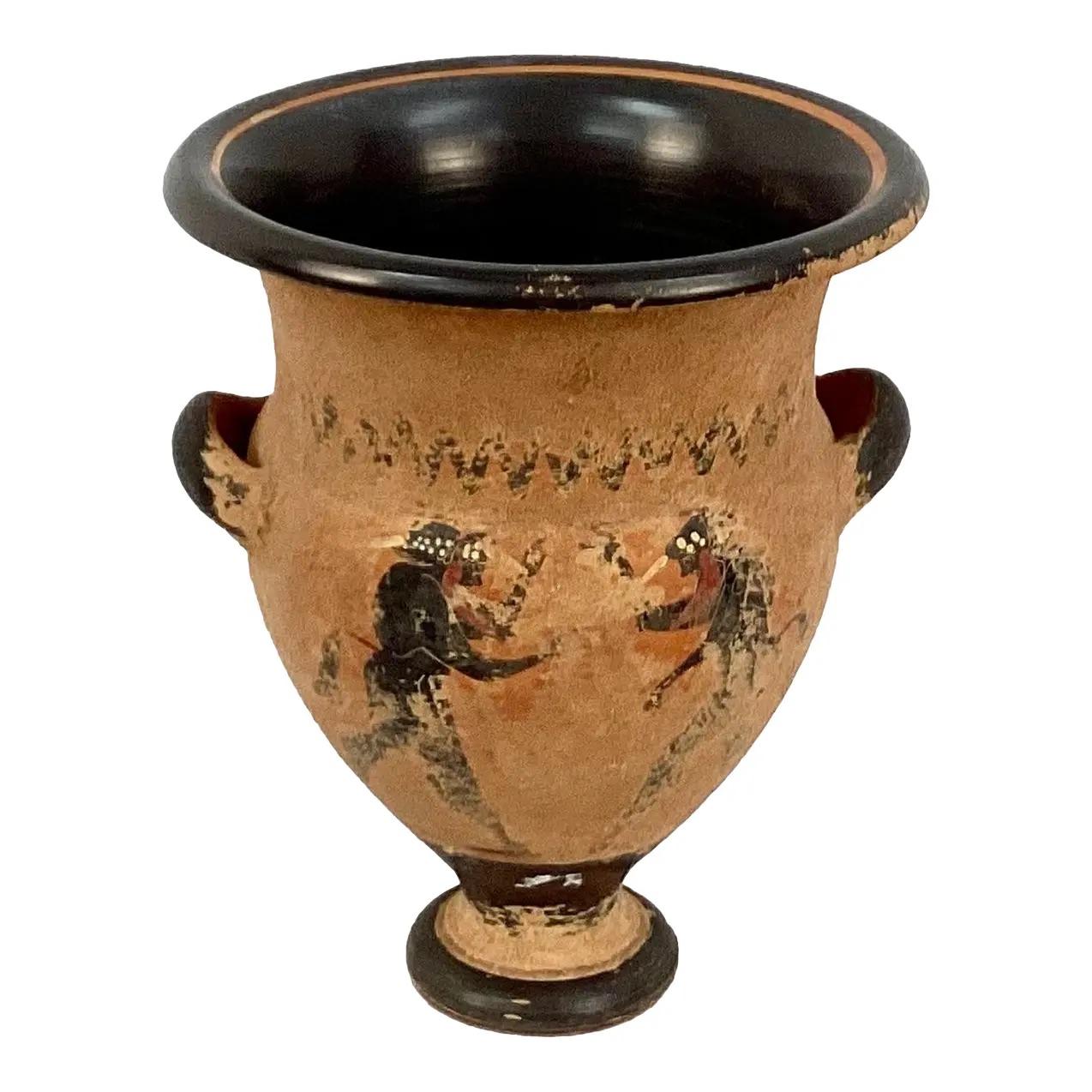 Late 19th Century Grand Tour style terracotta vessel decorated with Grecian figures with Amphora form, two handles on neck. Hand painted. 

Dimensions:
8.5