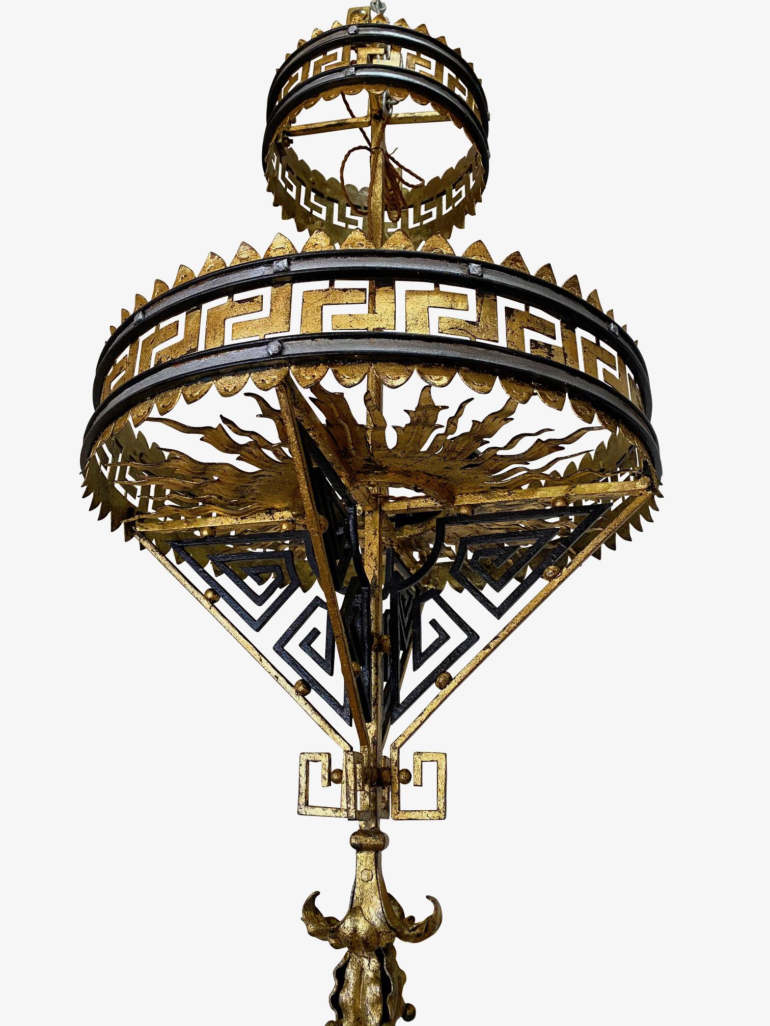 19th century French two-tier gold gilt metal chandelier
Greek key design
newly rewired and gold gilded.