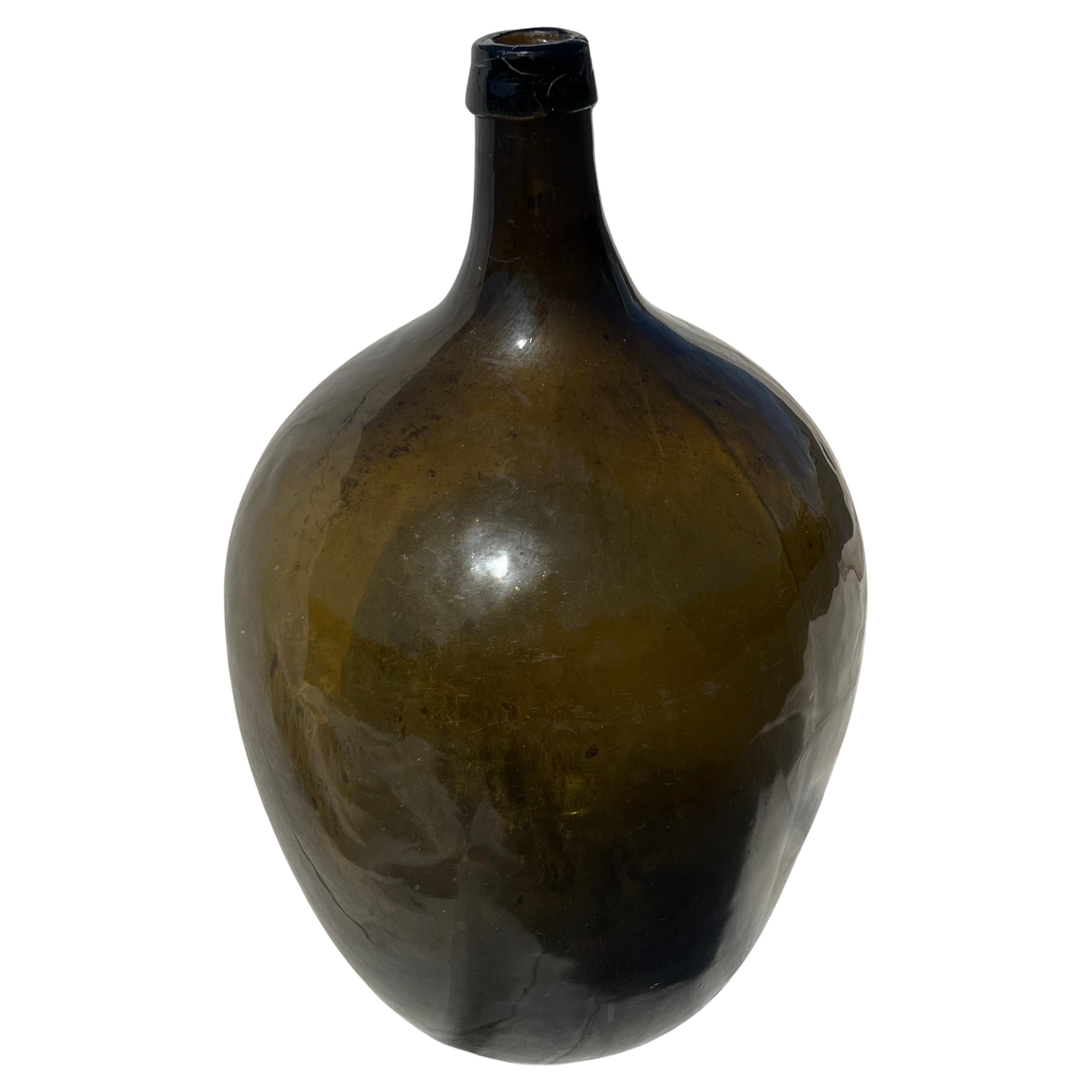 19th Century Green Glass Demijohn Bottle