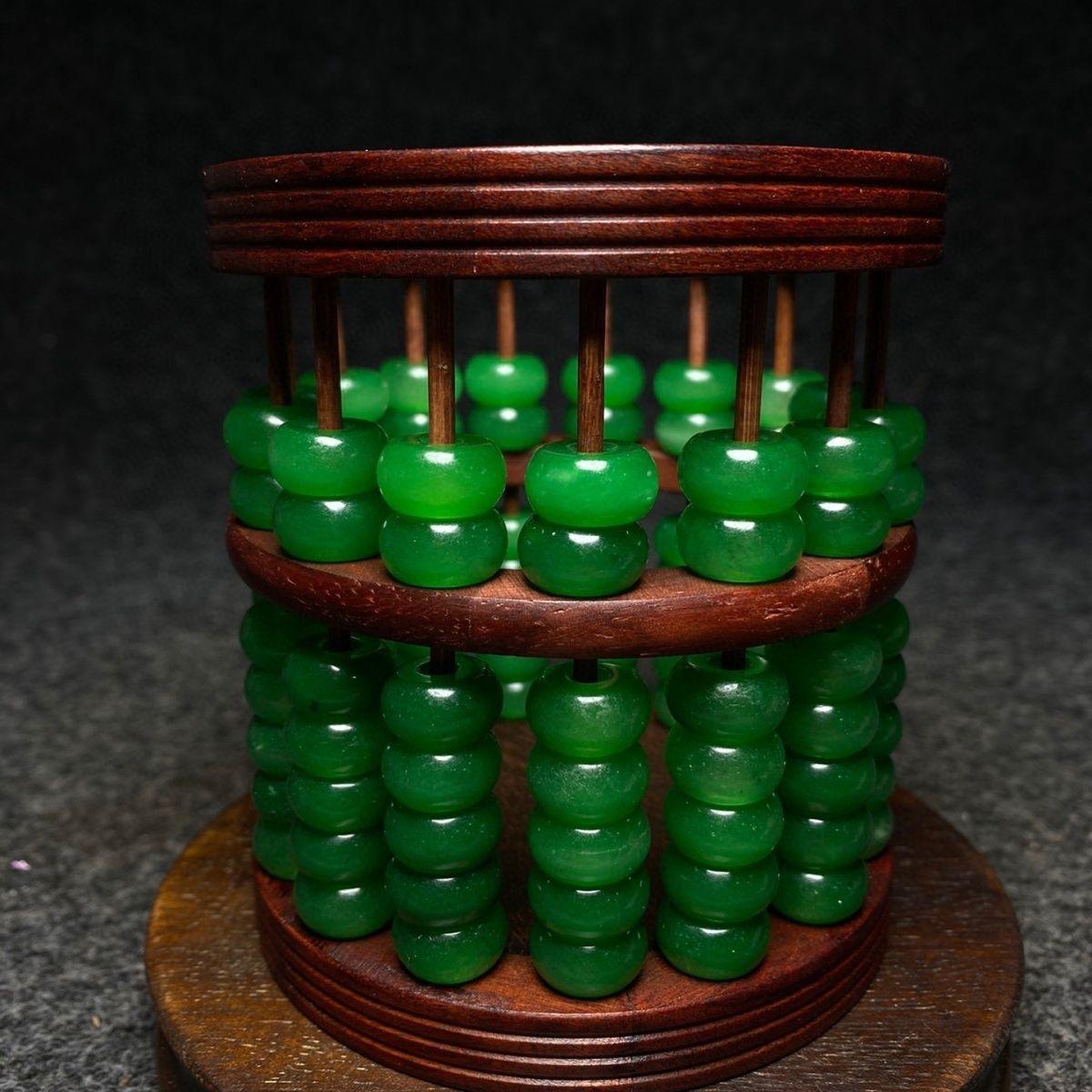 
19th Century Green Jade Beads Wood Carving Pen Box – Timeless Elegance

Discover the refined beauty of this 19th Century Green Jade Beads Wood Carving Pen Box, a remarkable blend of artistry and functionality. This exquisite piece features a