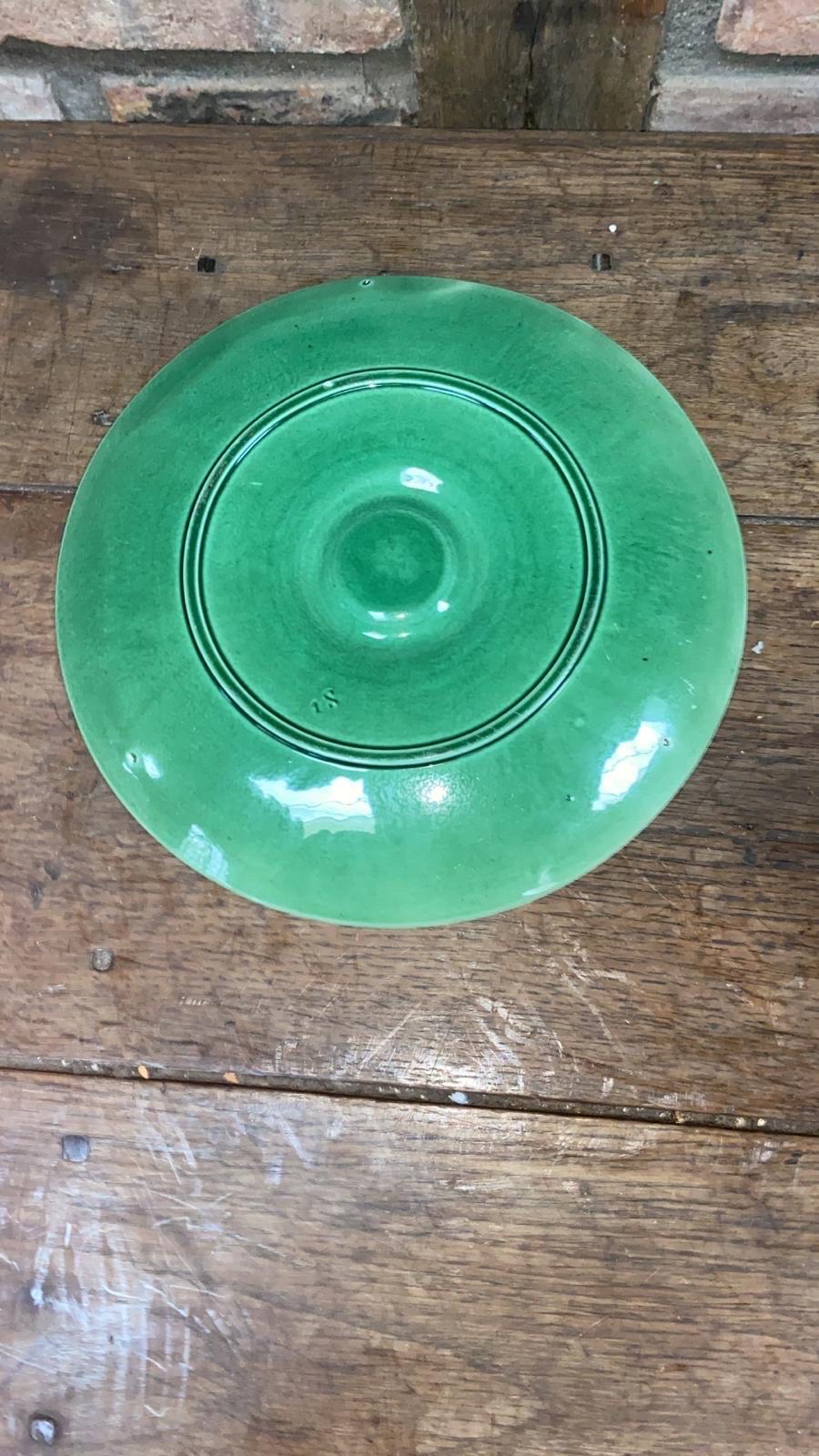 Colorful French Majolica green oyster plate with stylized leaves, circa 1890.
Very rare color.