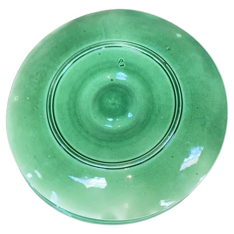 Colorful French Majolica green oyster plate with stylized leaves, circa 1890.
Very rare color.