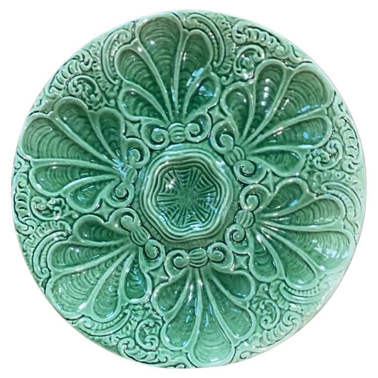 Colorful French Majolica green oyster plate with stylized leaves, circa 1890.
Very rare color.
