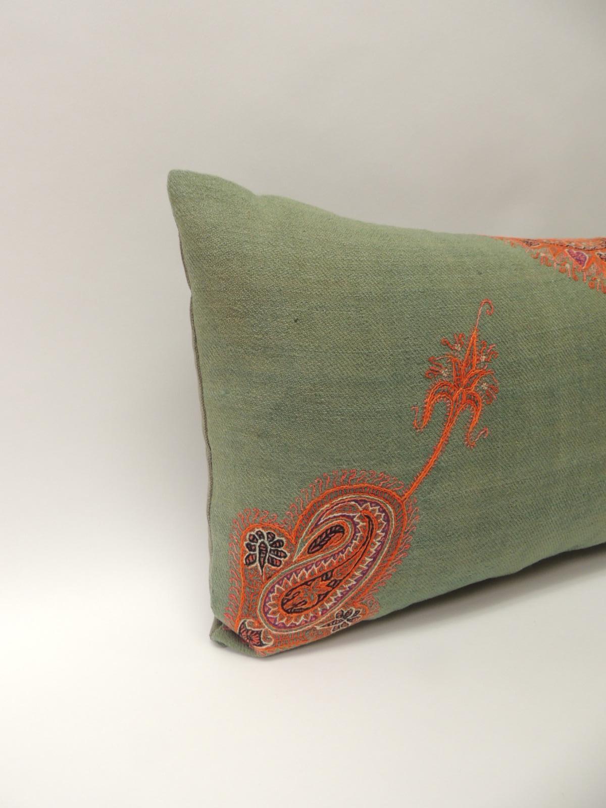 Pair of 19th century Paisley embroidery Persian long bolsters pillows
Antique Persian embroidered long bolster decorative pillows. Textiles on accent pillow embellished with silk threads embroidered onto green wool. Throw pillows enhanced with a