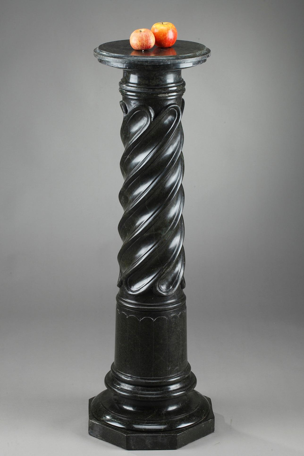 Late 19th century large spiraling pedestal stand with Doric capital. The column is sculpted in solid green marble. It is decorated with flutes and rests on a base with multiple terraced, beveled edges. The tray is marked: 32,

circa