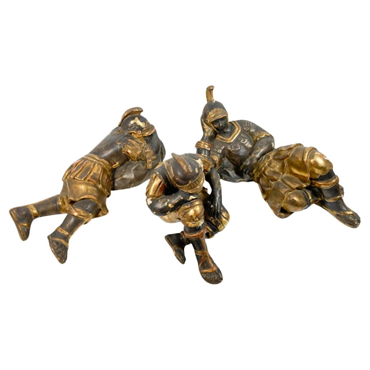 19th Century Group of Three Parcel Gilt Carved Wood Figures of Roman Soldiers For Sale