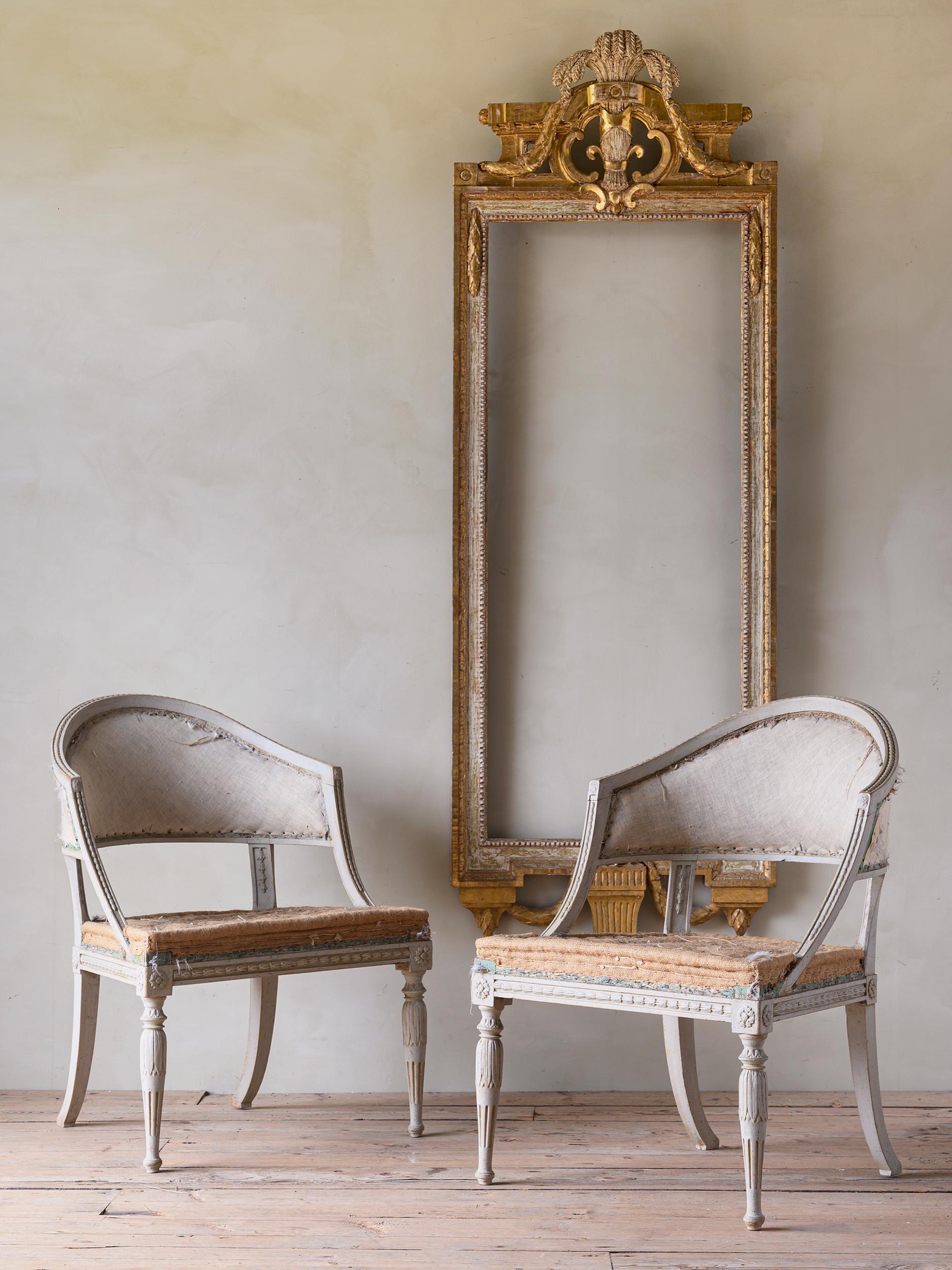 Fine pair of early 19th century Gustavian barrel back armchairs. With stamp from the Stockholm master chair makers guild. Ca 1810 Stockholm, Sweden. Attributed to Ephraim Stahl (1767-1820) Supplier to the Royal Court and one of the most