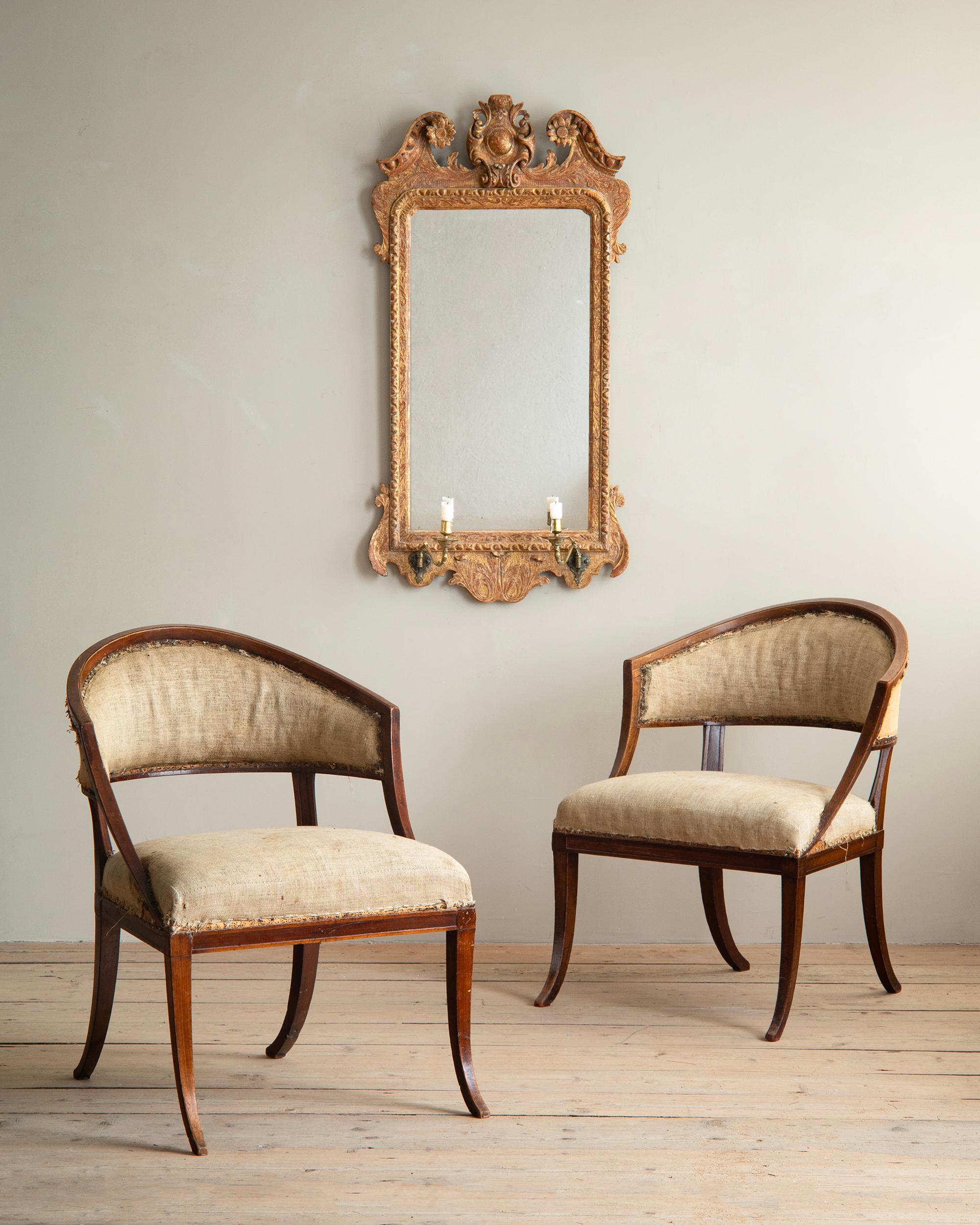 Fine early 19th century Gustavian barrel back armchairs in their original condition. Attributed to master chair maker Ephraim Sthal (1767-1820) Supplier to the Royal Court and one of the most sophisticated and inventive makers of his period. ca 1800