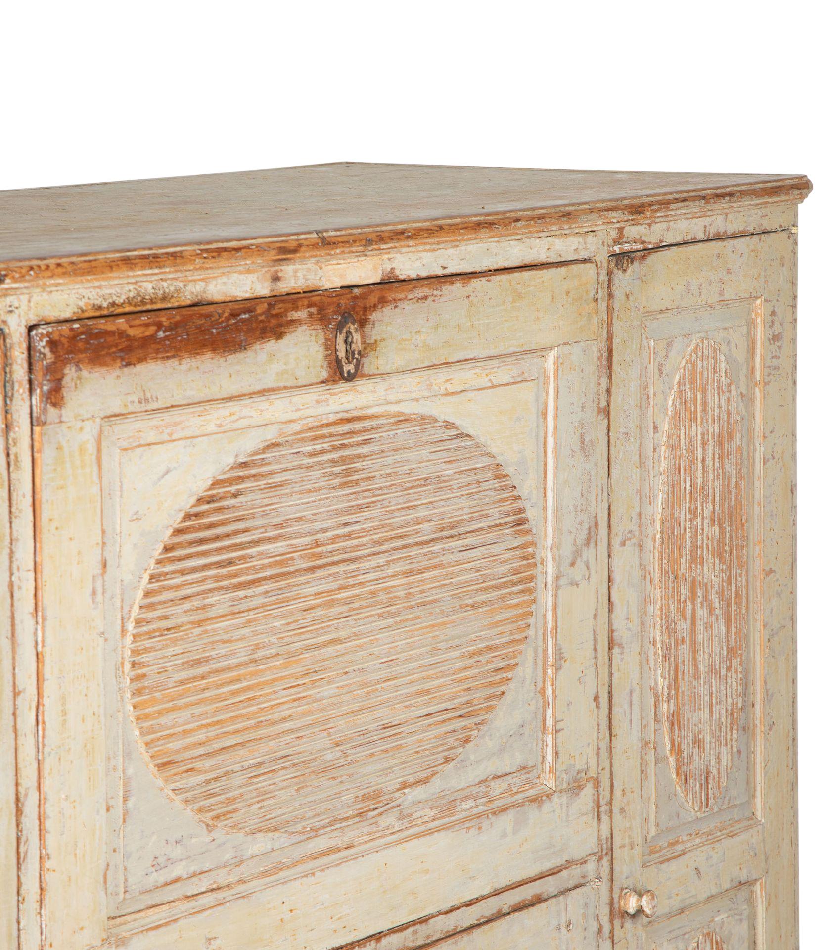 Magnificent 19th Century Gustavian period buffet of large proportions. 
With original paint, this buffet features a fall front desk with decorative oval-reeded panels. 
A very useful decorative storage piece.
