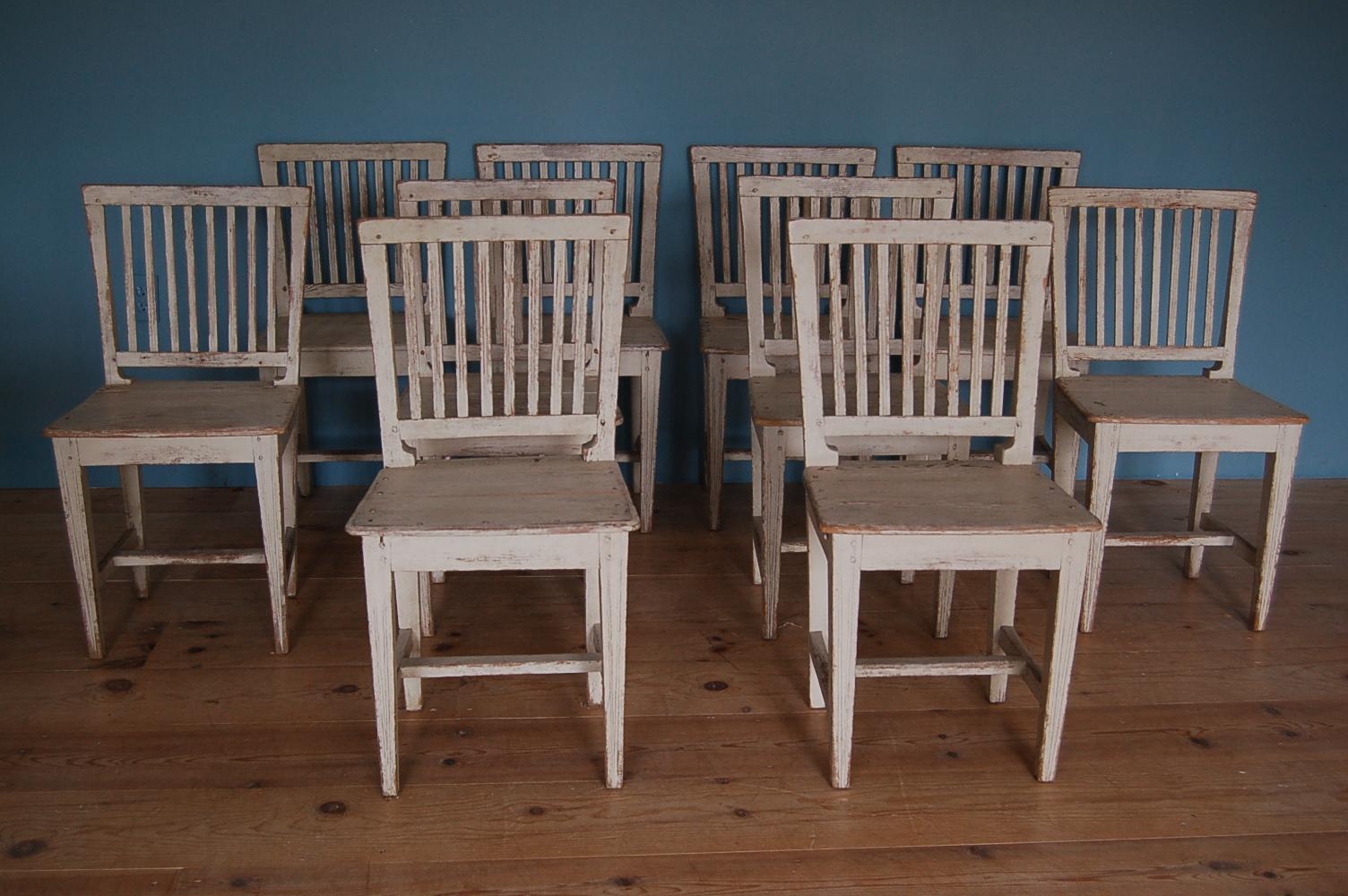 19th century Gustavian slat-back chairs, set of ten (10), Origin: Sweden, circa 1810.

Provenance: Private Collection, Hannibal French House, Sag Harbor, New York (acquired by Jed Johnson for the family kitchen).