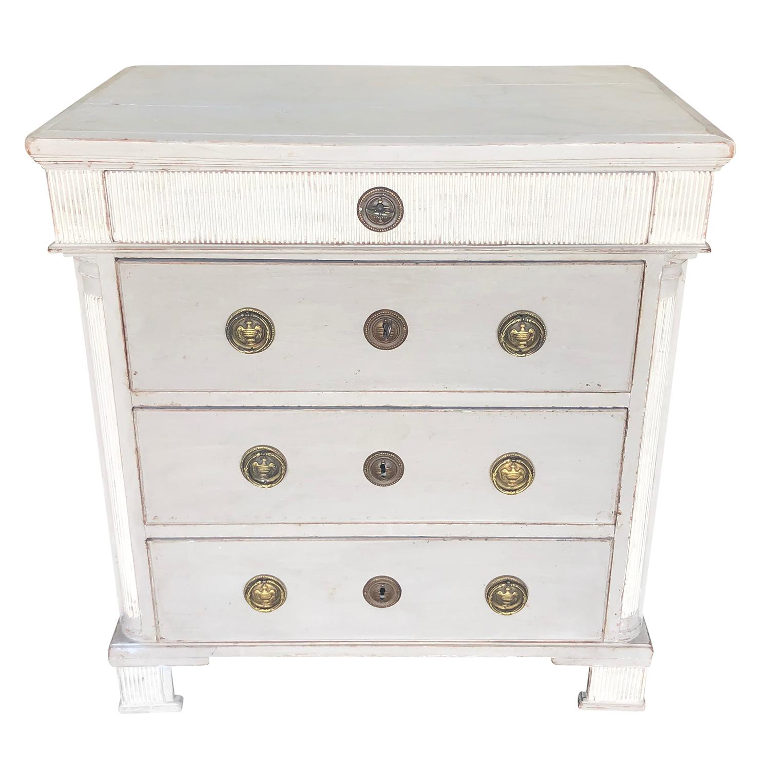 A 19th Century Swedish Gustavian Neoclassic chest with a painted faux finish marble top, in good condition. The antique Scandinavian chest is made of hand crafted Pinewood, richly carved with delicate lines, four drawers, and a grey-white-cream