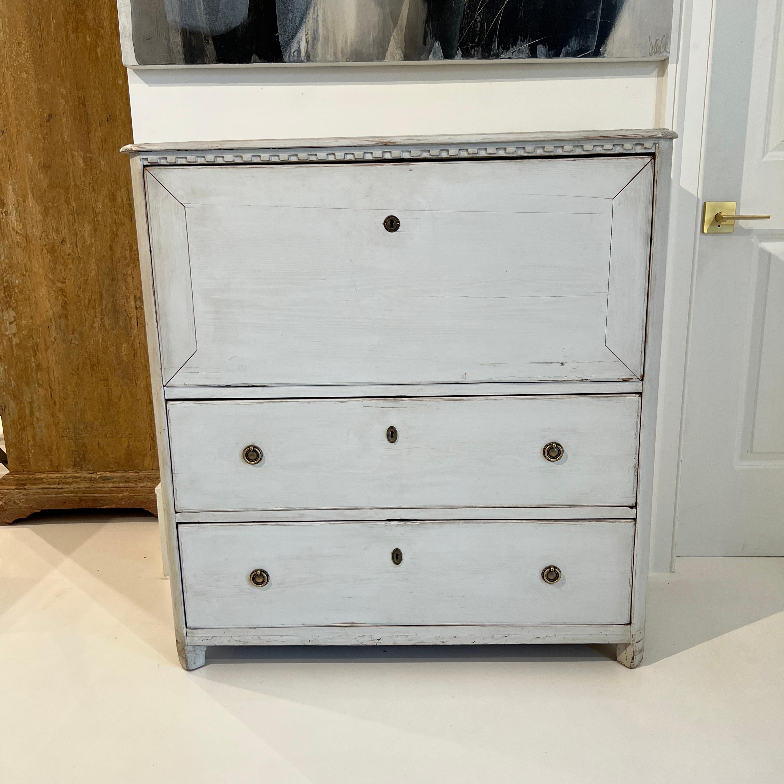 This Gustavian style desk is a peerless lesson in elegant restraint.  The simple exterior, when opened, reveals generous interior storage and ample work space.  The joy of this desk is that when your work is finished, you close it and quiet