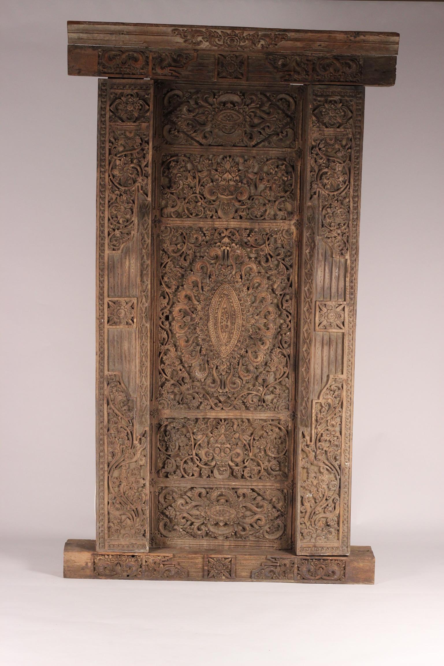 An ornate and highly skilled early example of hand carved Balinese Temple door. Discovered in the interior of the Island near Ubud by our principle Director some 22 years ago.
Having travelled extensively with a guide, we uncovered a treasure trove
