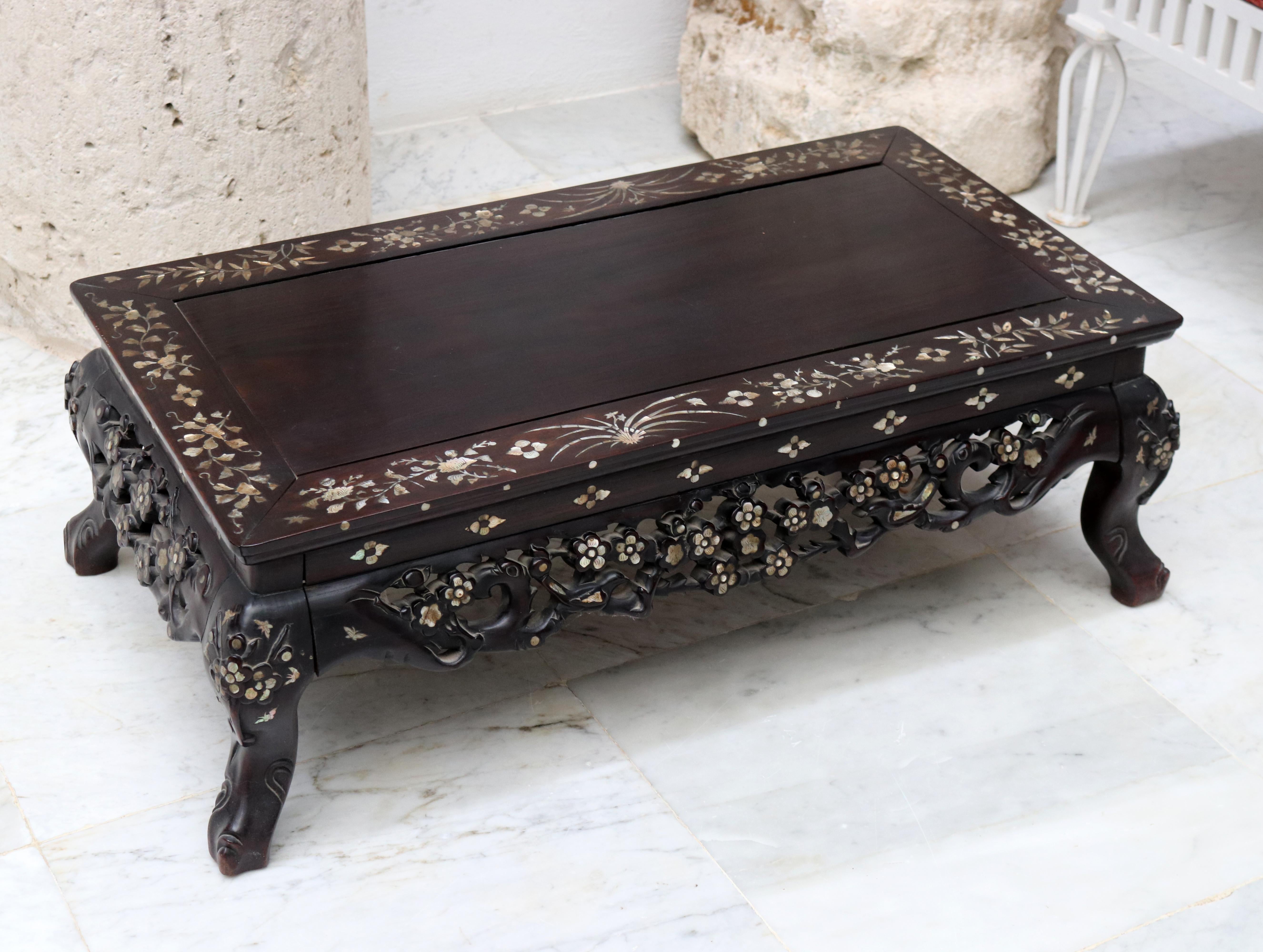 19th century hand carved Chinese rosewood table with mother of pearl inlay.