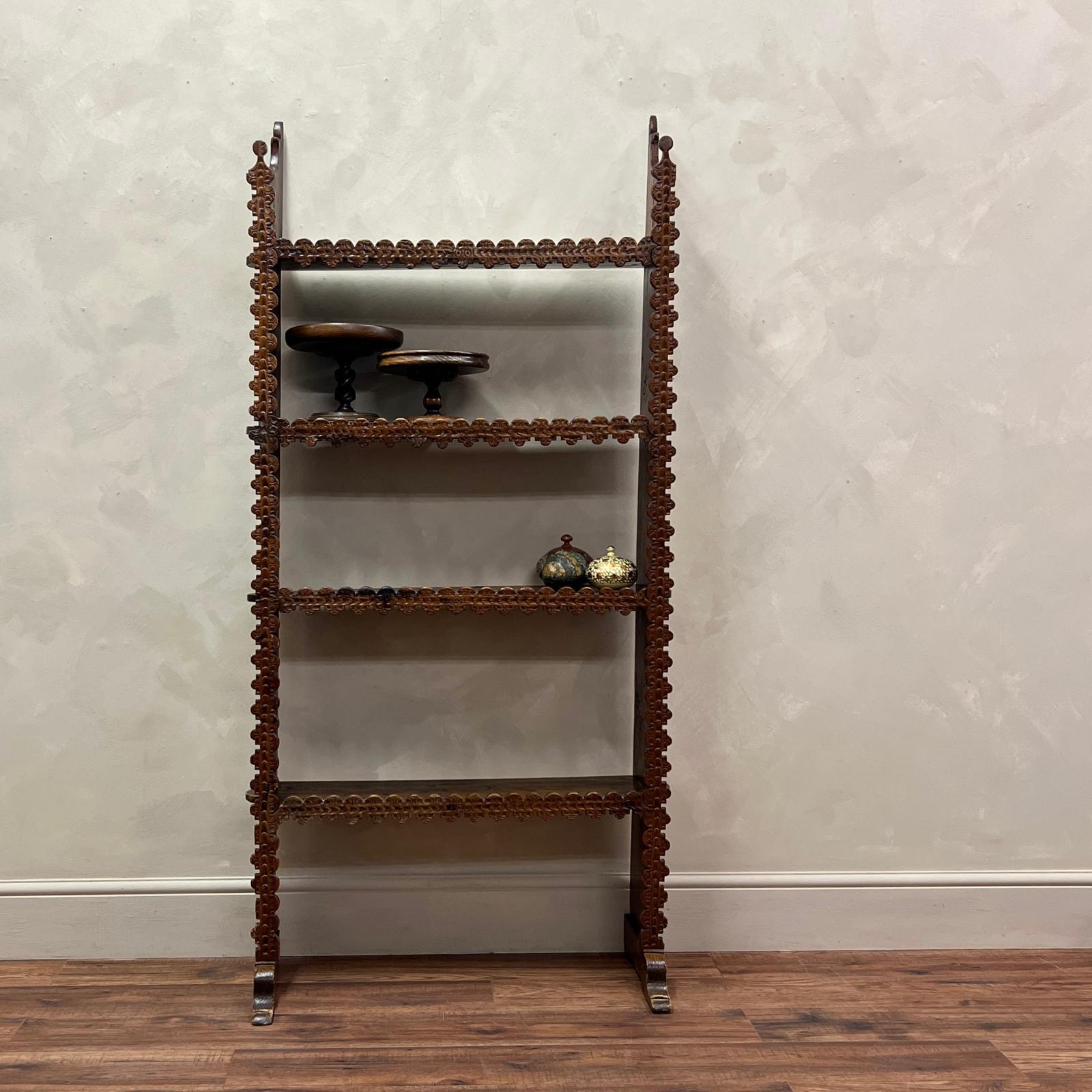 Rare 19th Century Hand Carved Etagere.
This style of carving is very typical of certain areas of the Pyranees.
Made from pitch pine with pegged sides and primitively carved fronts, this would make a talking point in any room.

France, circa