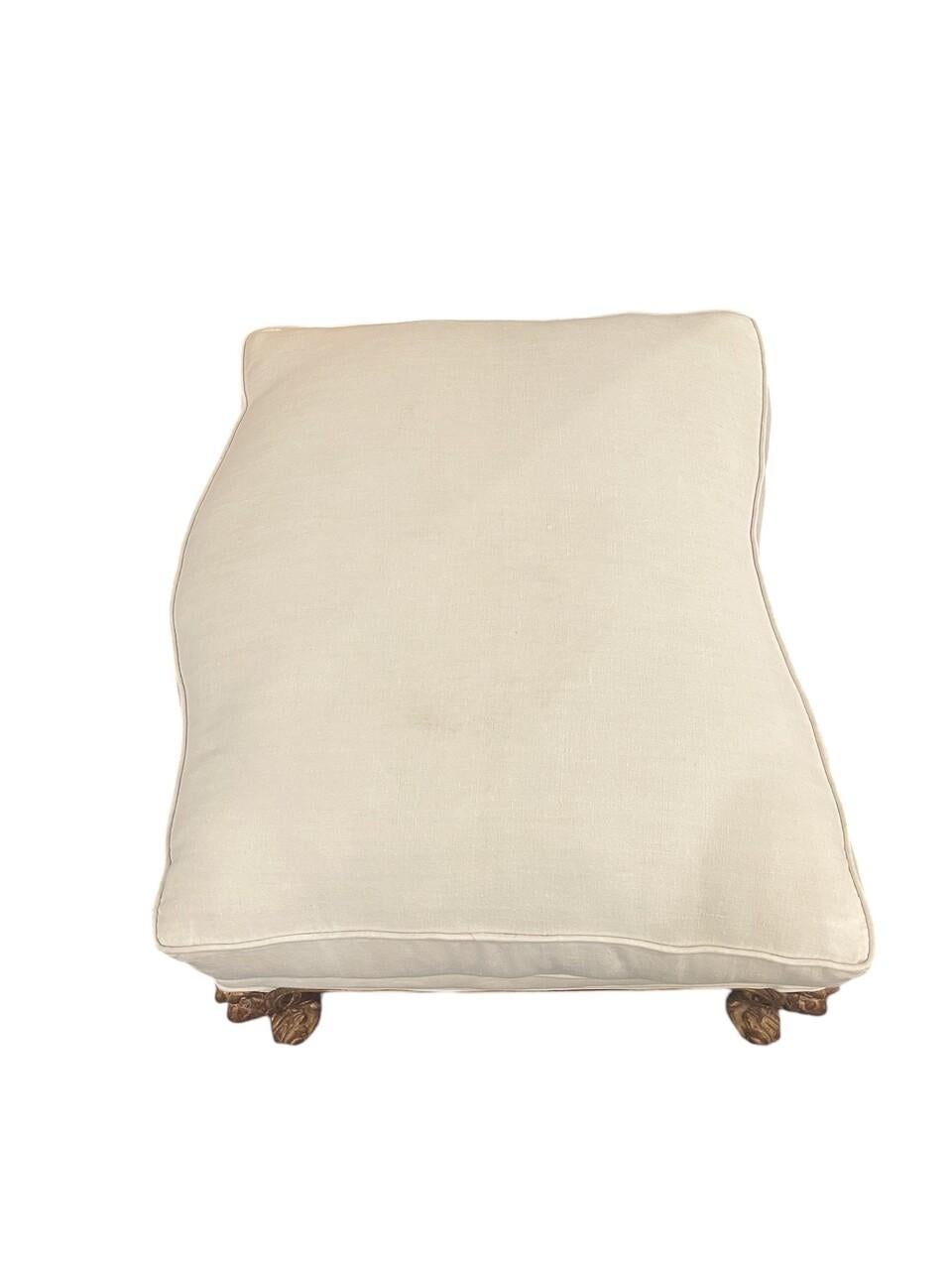 19th Century Hand Carved French Gold Gilt Ottoman reupholstered in antique linen.