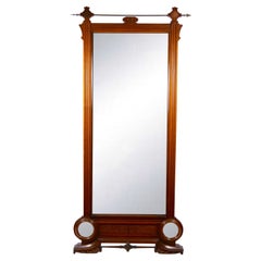 Miroir mural du 19e siècle à cadre en acajou sculpté à la main