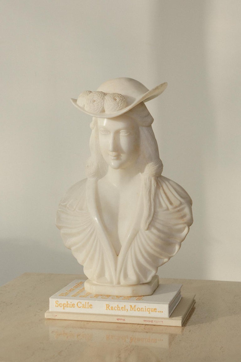 19th century hand carved solid white Carrara Italian marble lady statue in beautiful details. Shallow cracks front and back and signs of age consistent throughout. Please check the images for details. 

Measures: H 18” x W 12.5” x D 6”.