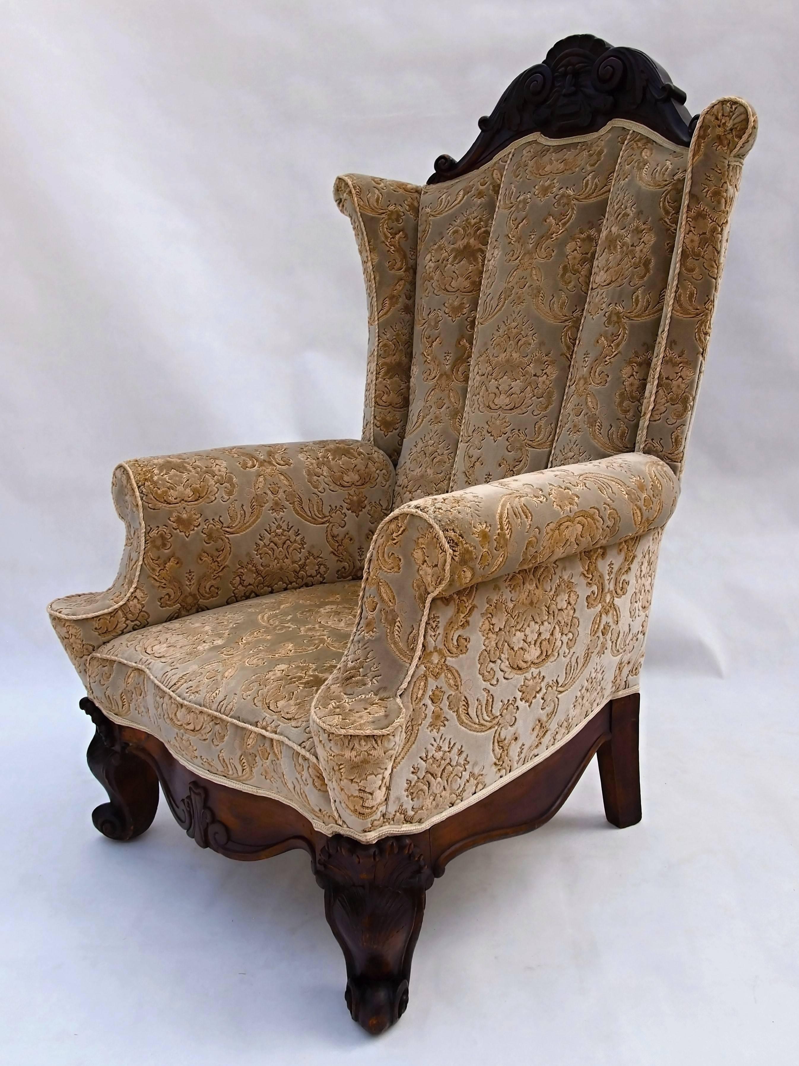 Rare gorgeous massive wing armchair with carved walnut legs and top,
the first half of 19th century.