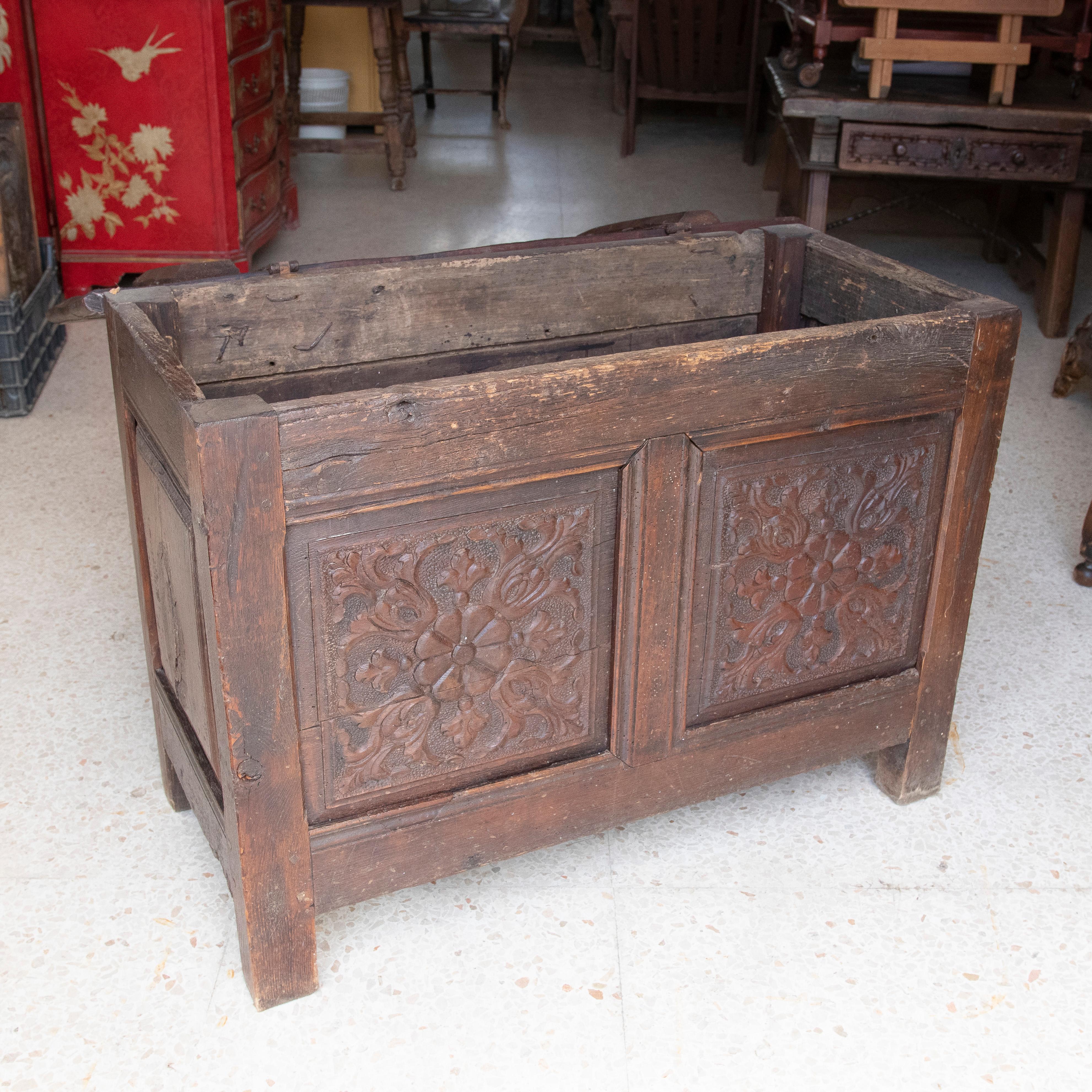 19th century hand-carved wooden trunk.